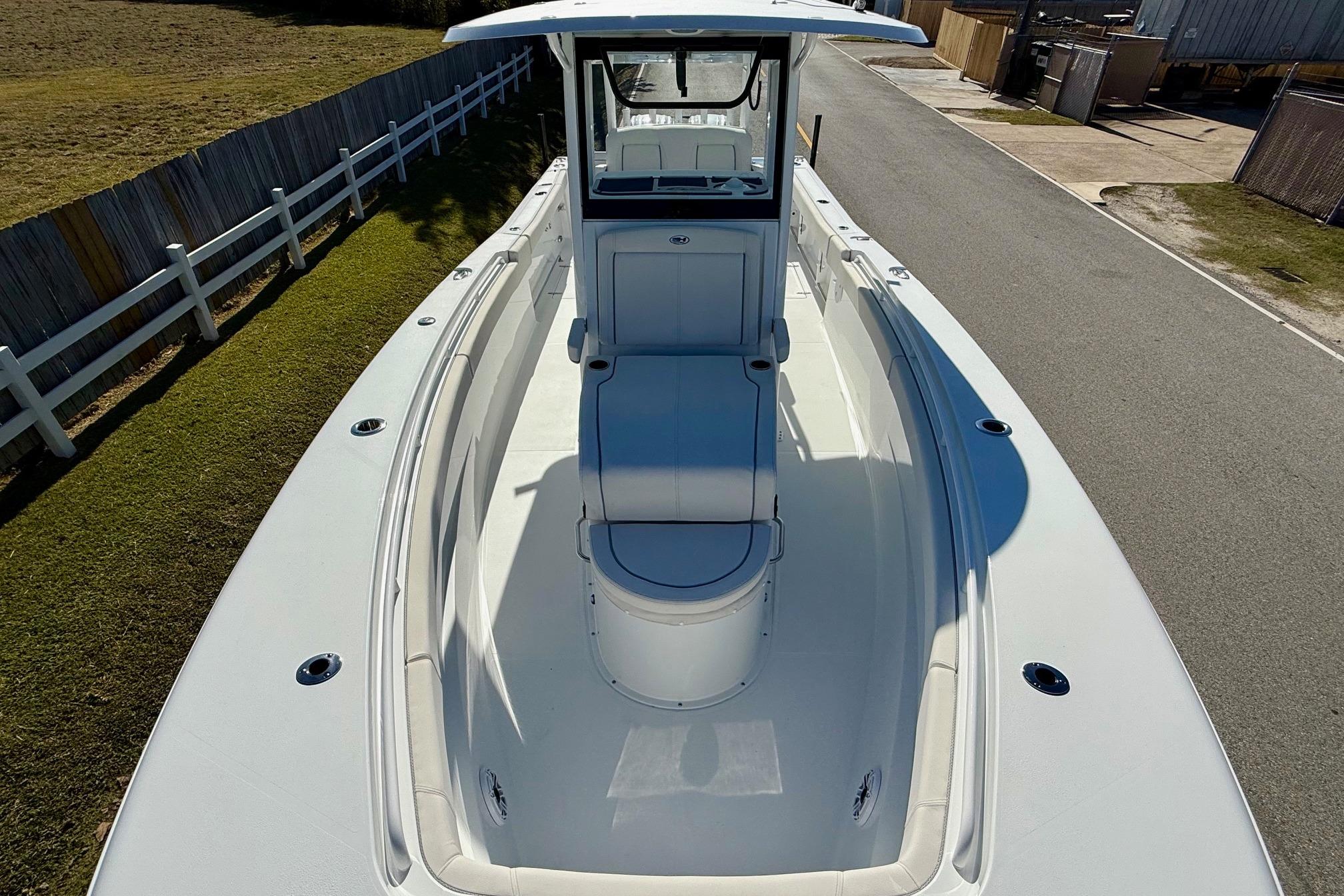 2026 Sea Hunt Gamefish 30 Coffin Box boat, spacious deck, white finish, outdoor setting.