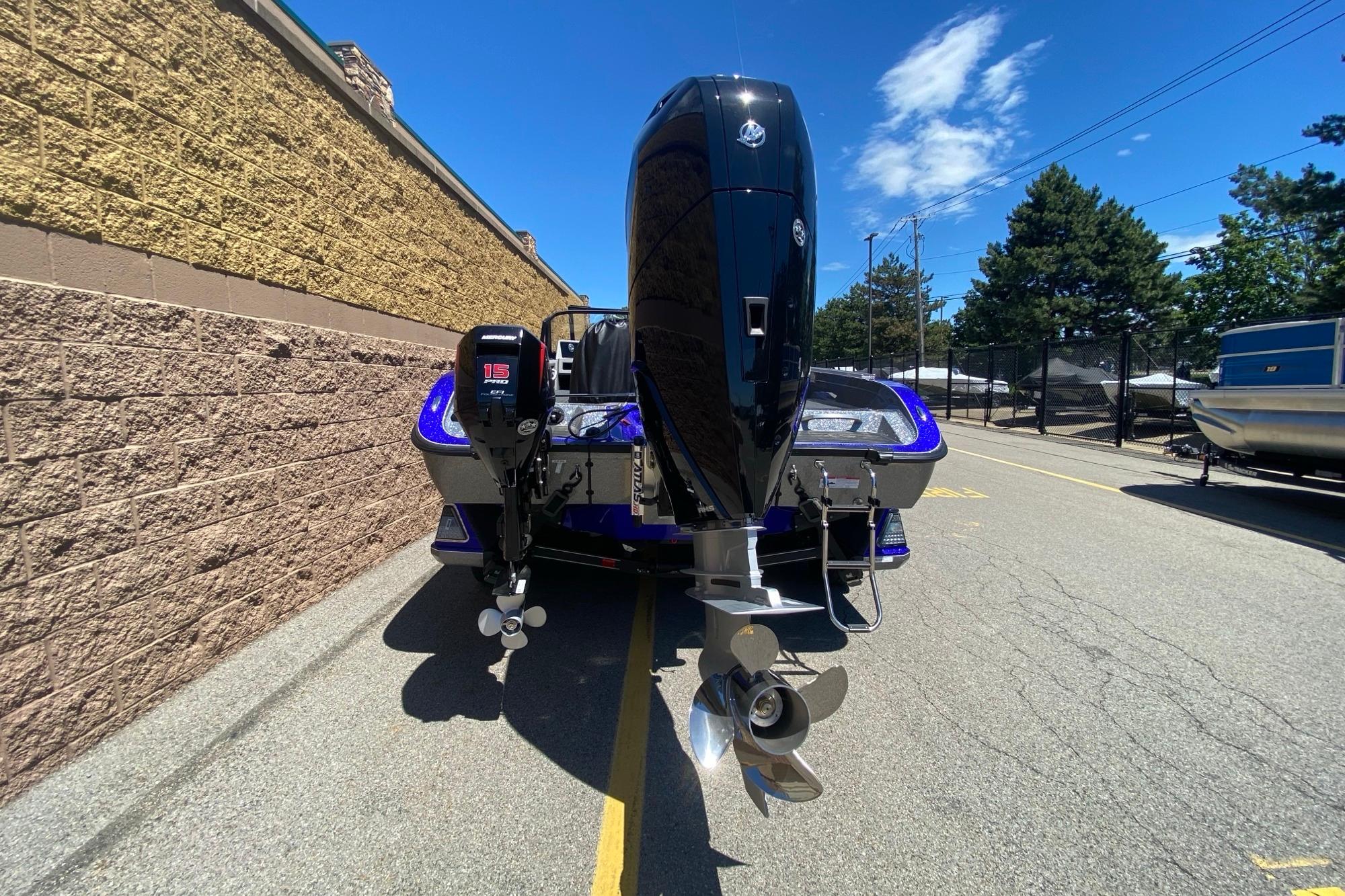 2026 Ranger 622FS Pro boat with dual outboard motors on a sunny day.