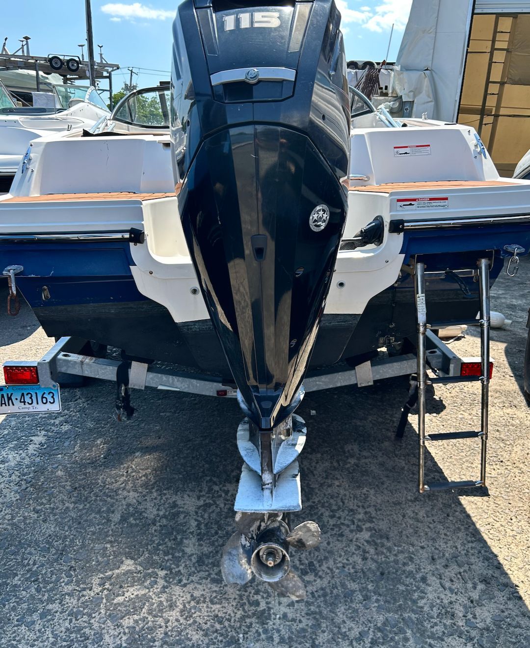 The image shows the rear of a 2019 Bayliner VR4 Bowrider OB with an outboard motor.