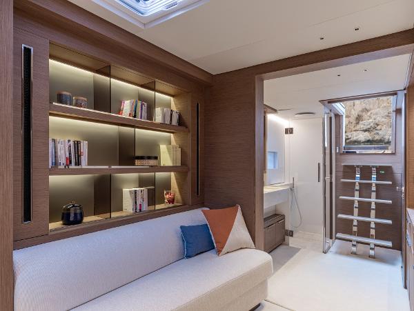 Luxurious interior of 2025 Lagoon SIXTY 7 yacht with modern design and cozy seating area.