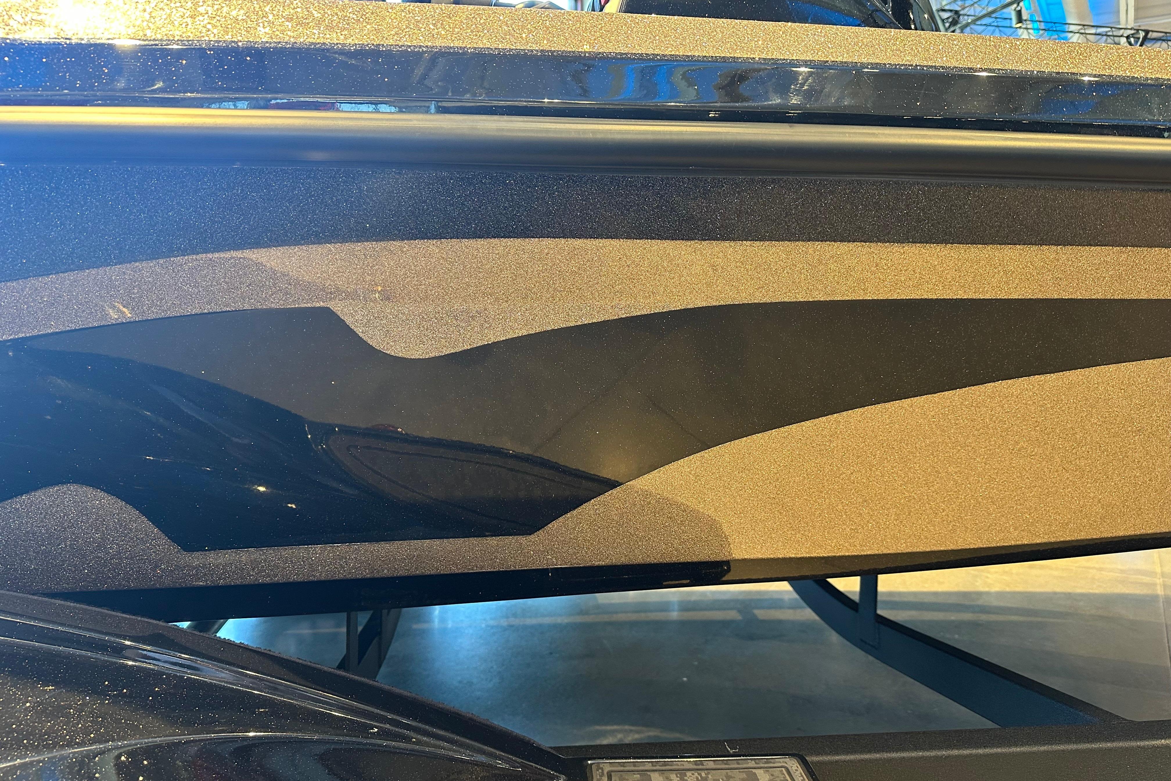2026 Nitro Z19 XL boat with sleek black and gold design details.