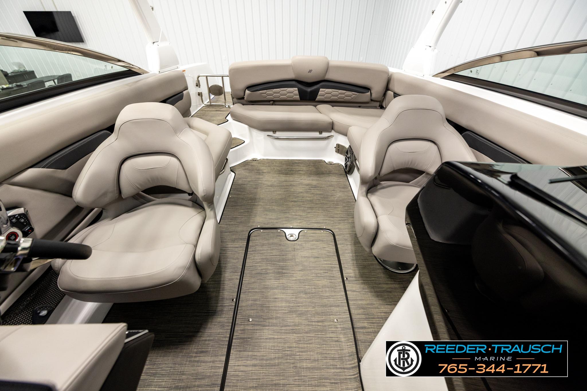 Interior of 2024 FOURWINNS HD5 Surf boat with luxurious seating and modern design.