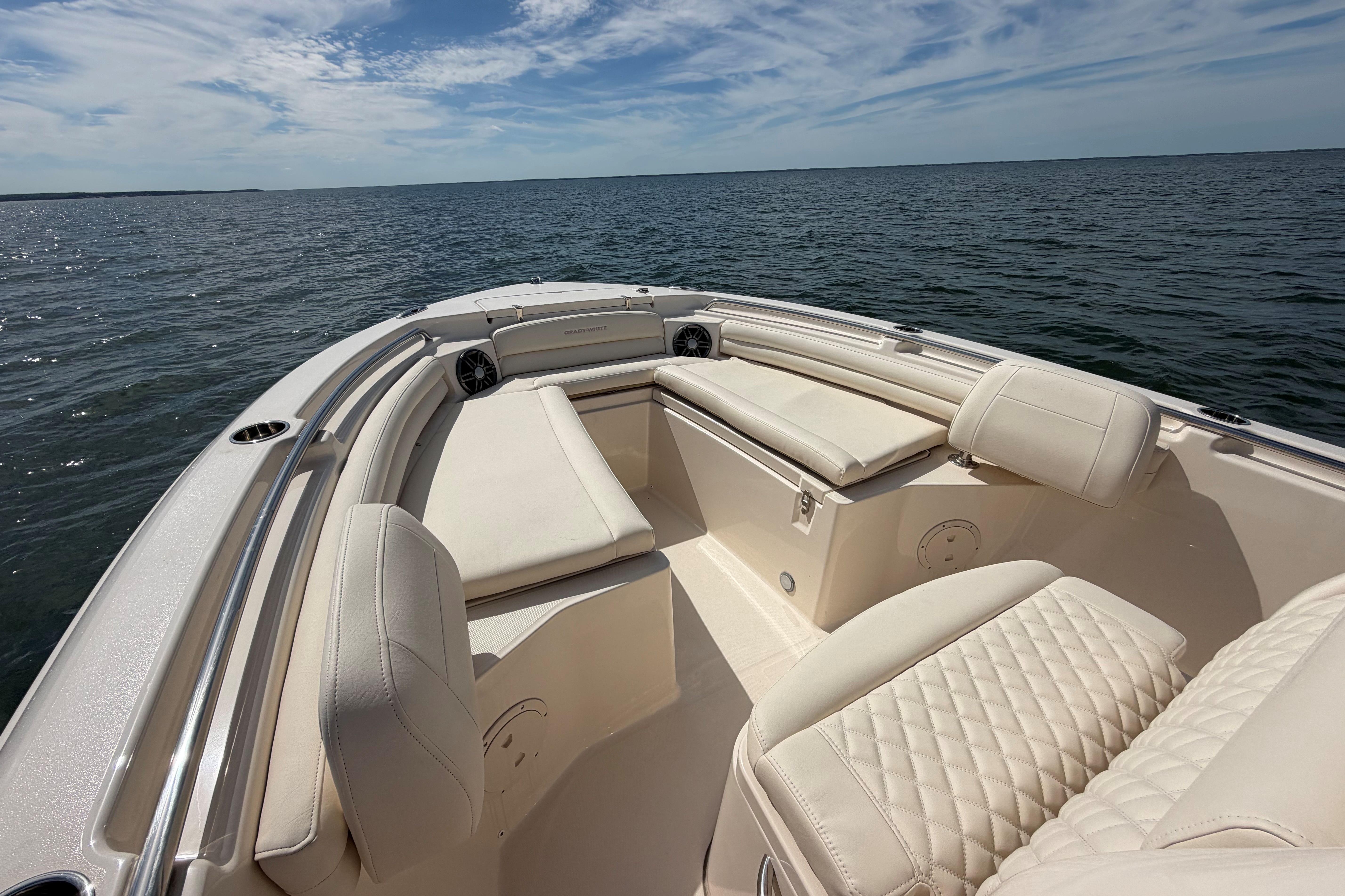 2026 Grady-White Fisherman 216 boat interior with cushioned seating on open water.