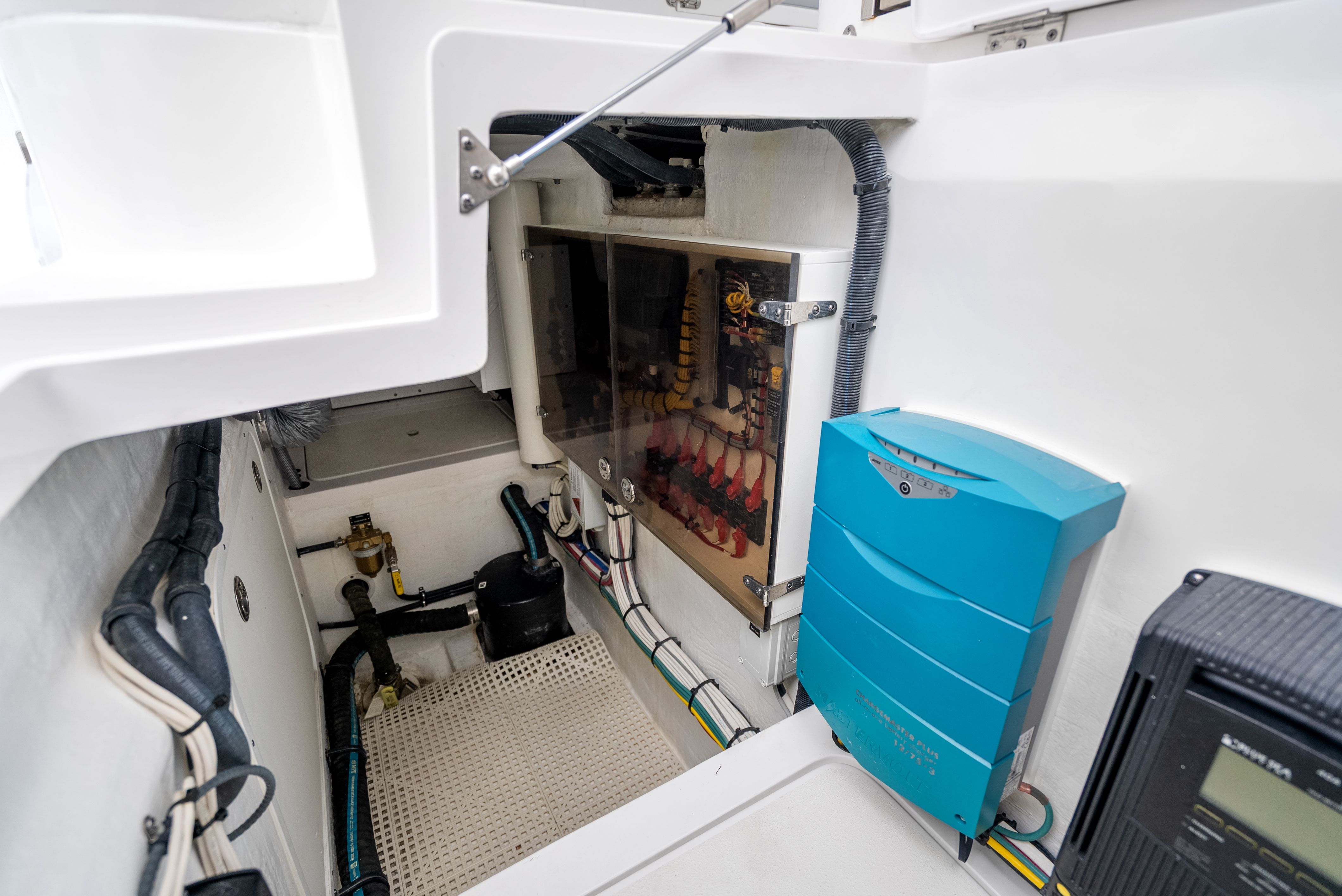 Electrical room of 2024 Intrepid 477 Evolution with wiring and control units.