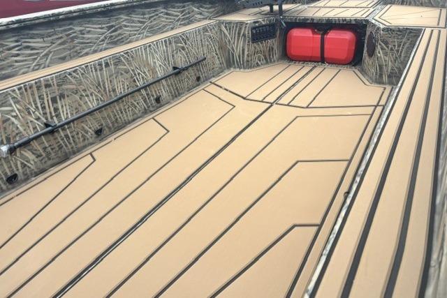 2026 Tracker Grizzly 1650 T Prairie Wings Edition boat interior with camouflage design.