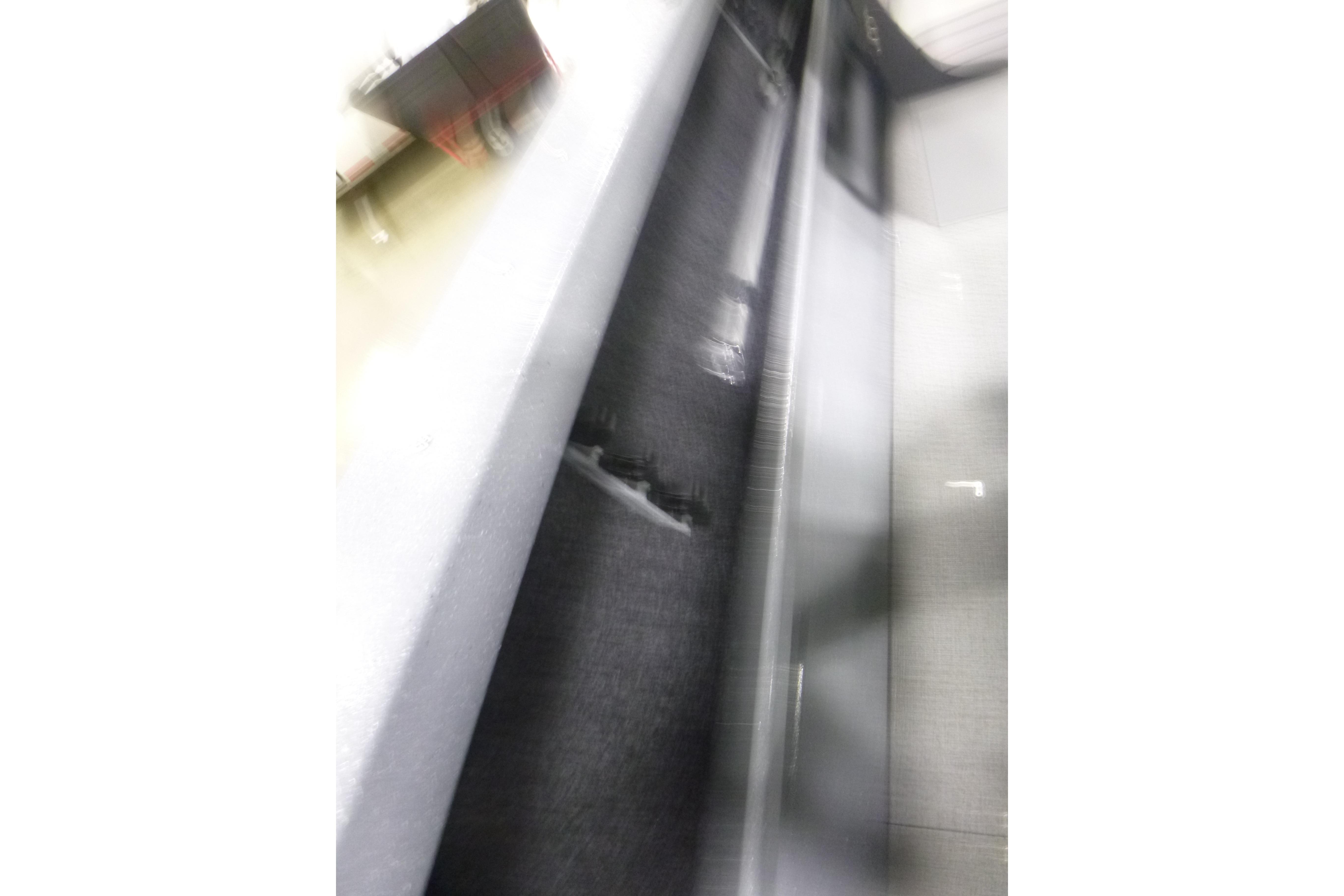 Blurred interior view of KingFisher 2025 Falcon boat, showcasing sleek design elements.