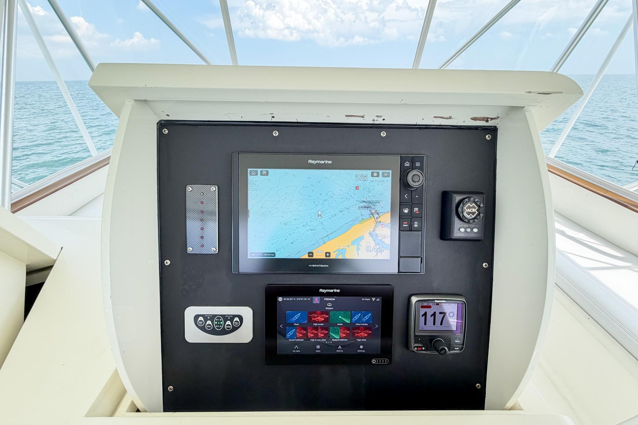 Control panel of a 1998 Blackwell Custom Carolina Sportfish boat with navigation equipment.