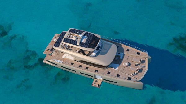 Luxurious 2025 Lagoon 83 yacht on clear turquoise water, featuring spacious deck and modern design.