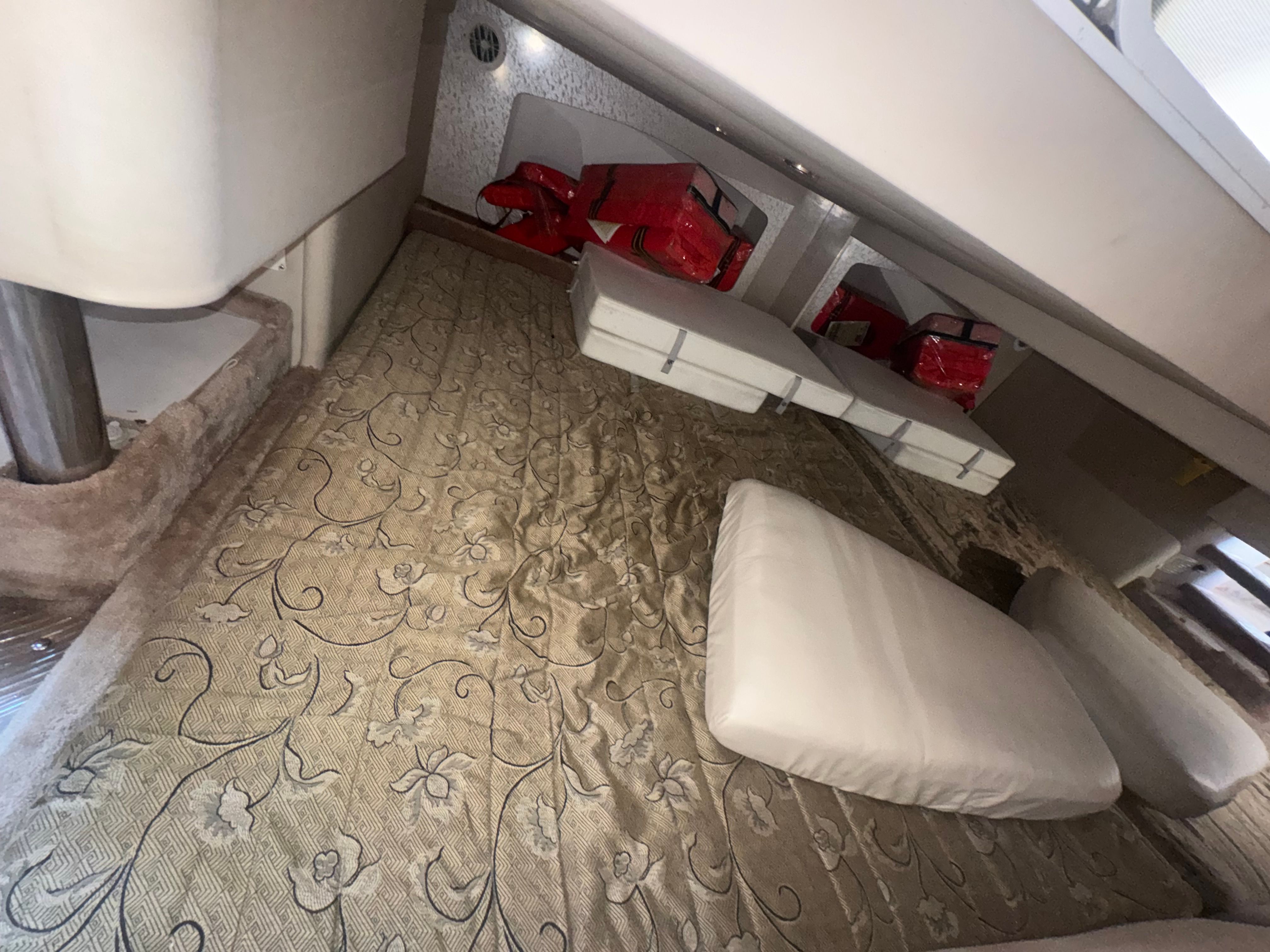 Interior of 2001 Formula 37 SUPER SPORT boat with cushions.