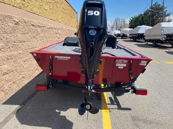 2025 Tracker Bass Tracker Classic XL boat with Mercury 50 engine, parked outdoors.
