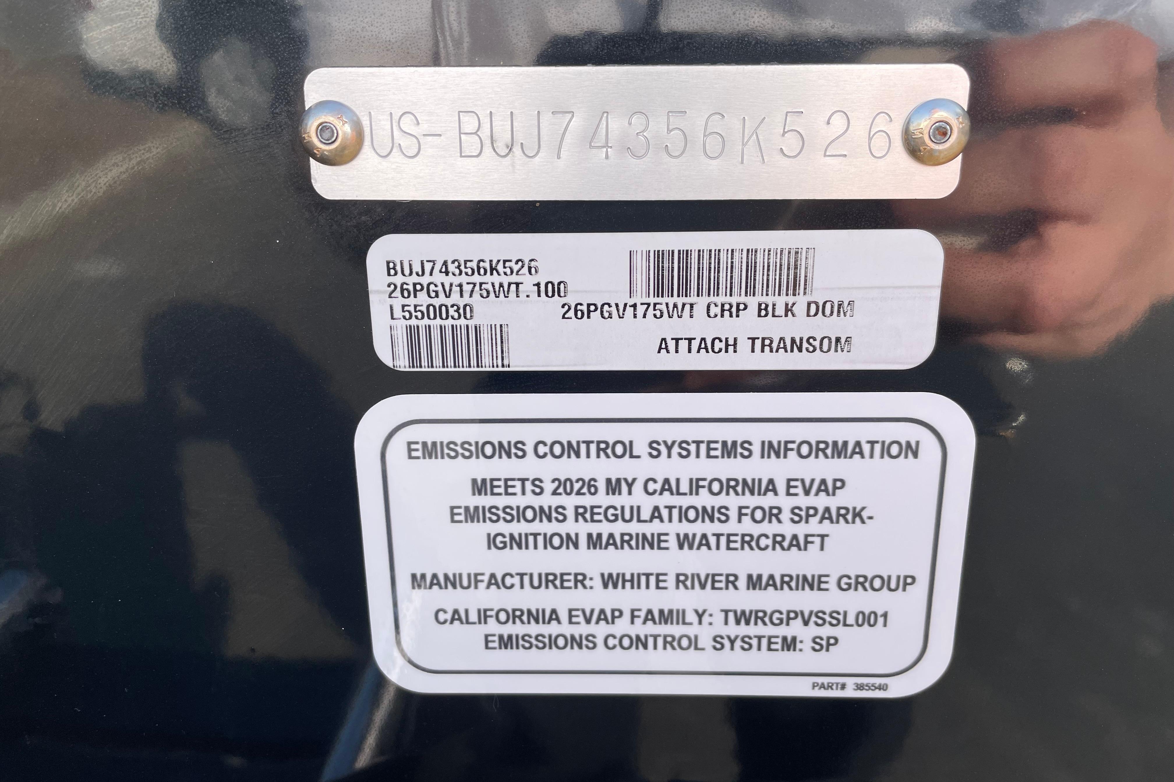 2026 Tracker Pro Guide V-175 WT emissions control information label on boat transom.