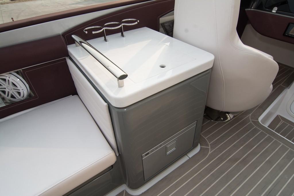 2019 Donzi 41 GT boat interior with seating and built-in sink.
