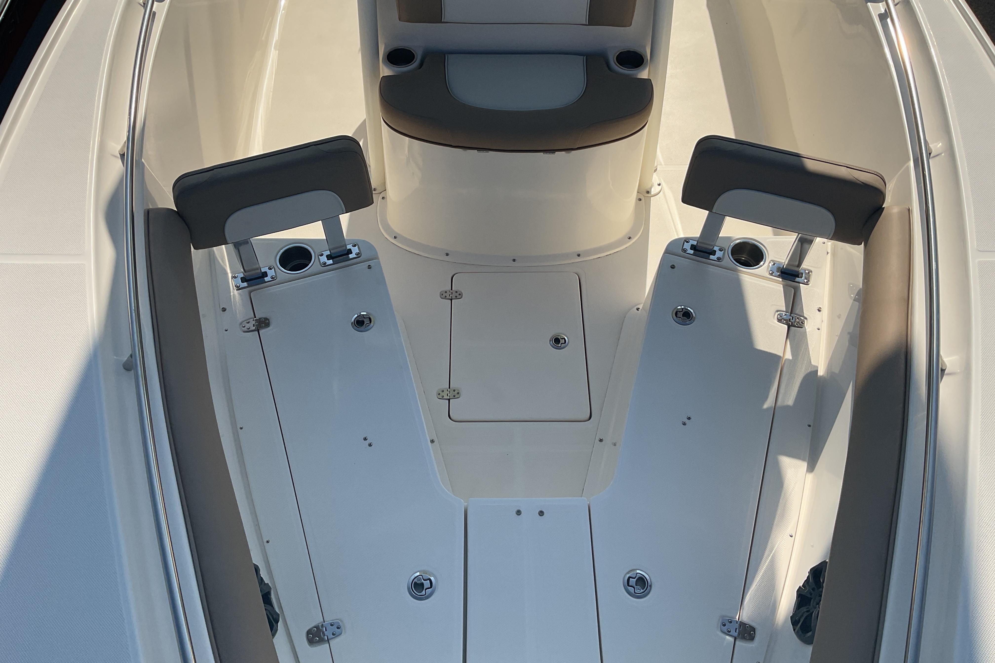 2023 Sea Born SX239 Offshore boat interior with seating and storage compartments.