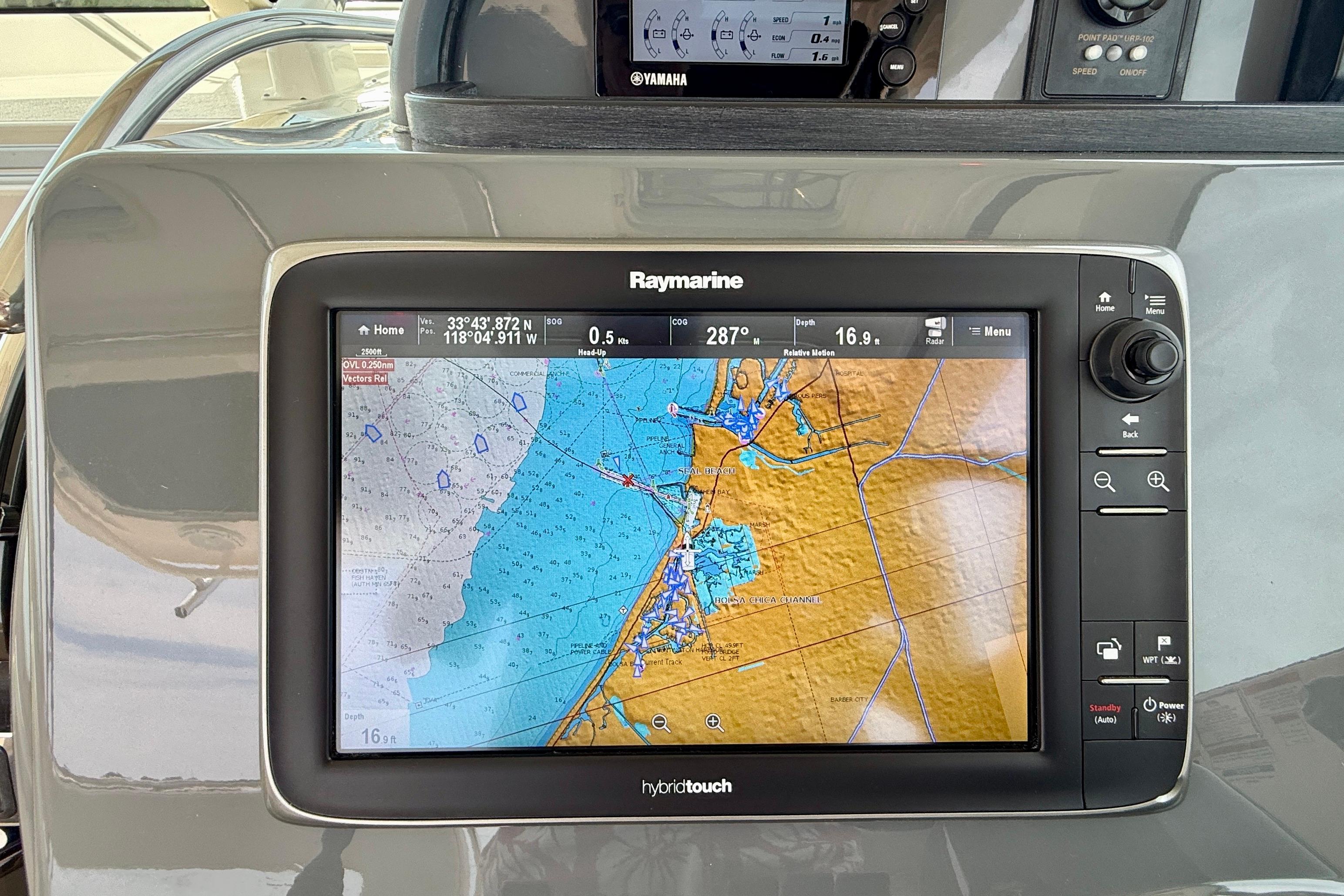 Raymarine navigation display on 2012 Pursuit OS 345 Offshore boat dashboard.