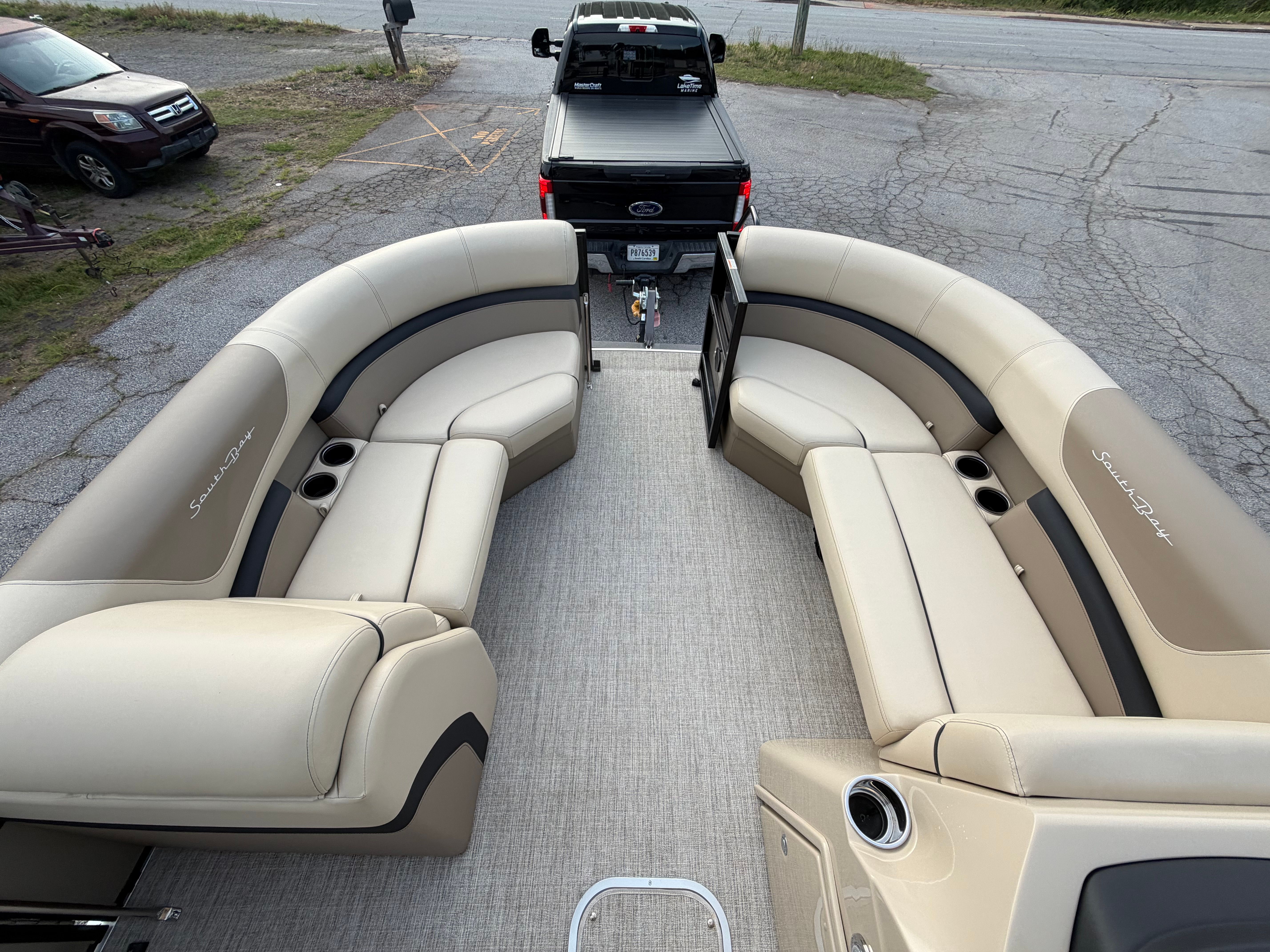 2023 South Bay S222 CR2 pontoon boat with luxurious seating.