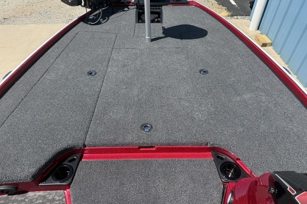 2026 Nitro Z20 XL Pro boat deck with gray carpeting and red trim.