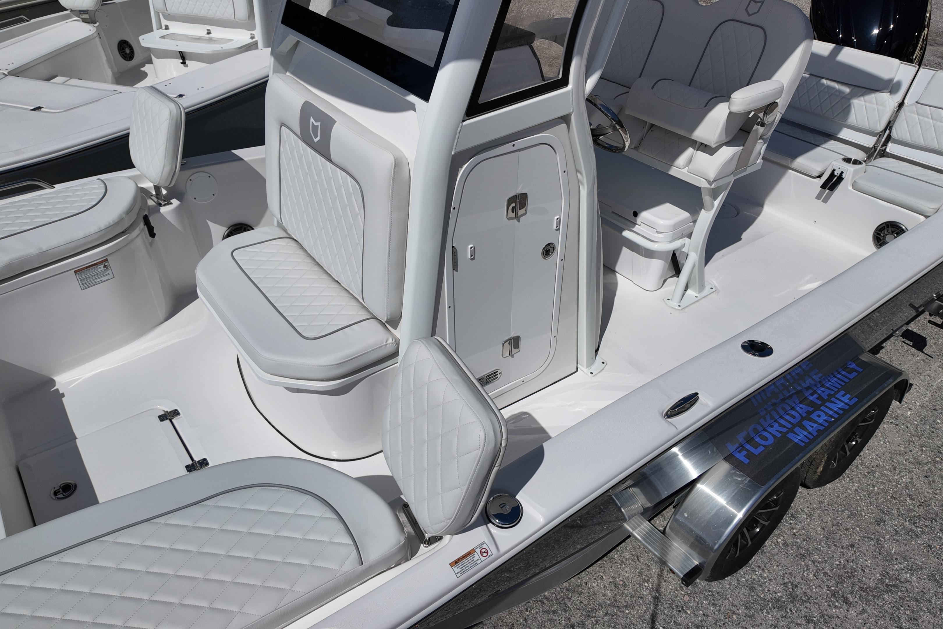 2026 Sea Fox 251 Bay Fox boat interior with cushioned seating and modern design.