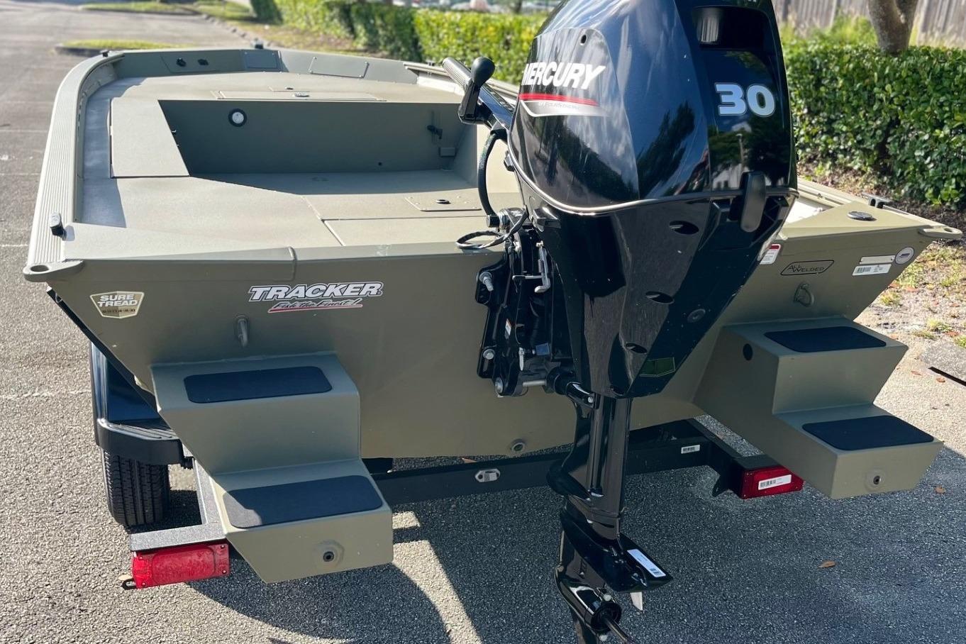 2026 Tracker Grizzly 1654 T Sportsman boat with Mercury 30 outboard motor.