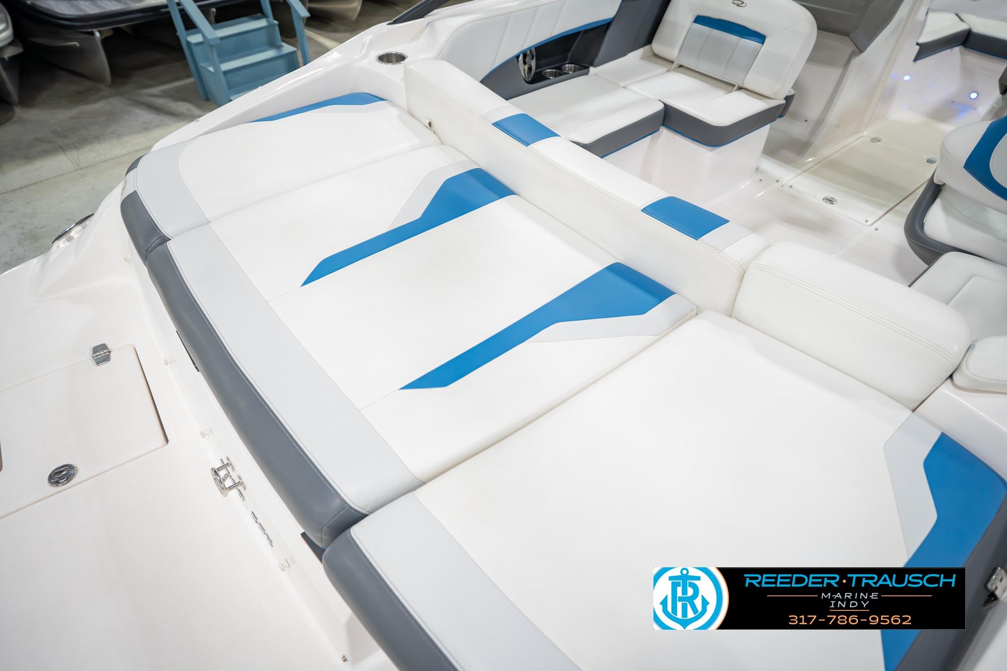 2015 Regal 2000 ESX Bowrider interior with white and blue seating, showcased by Reeder Trausch Marine.