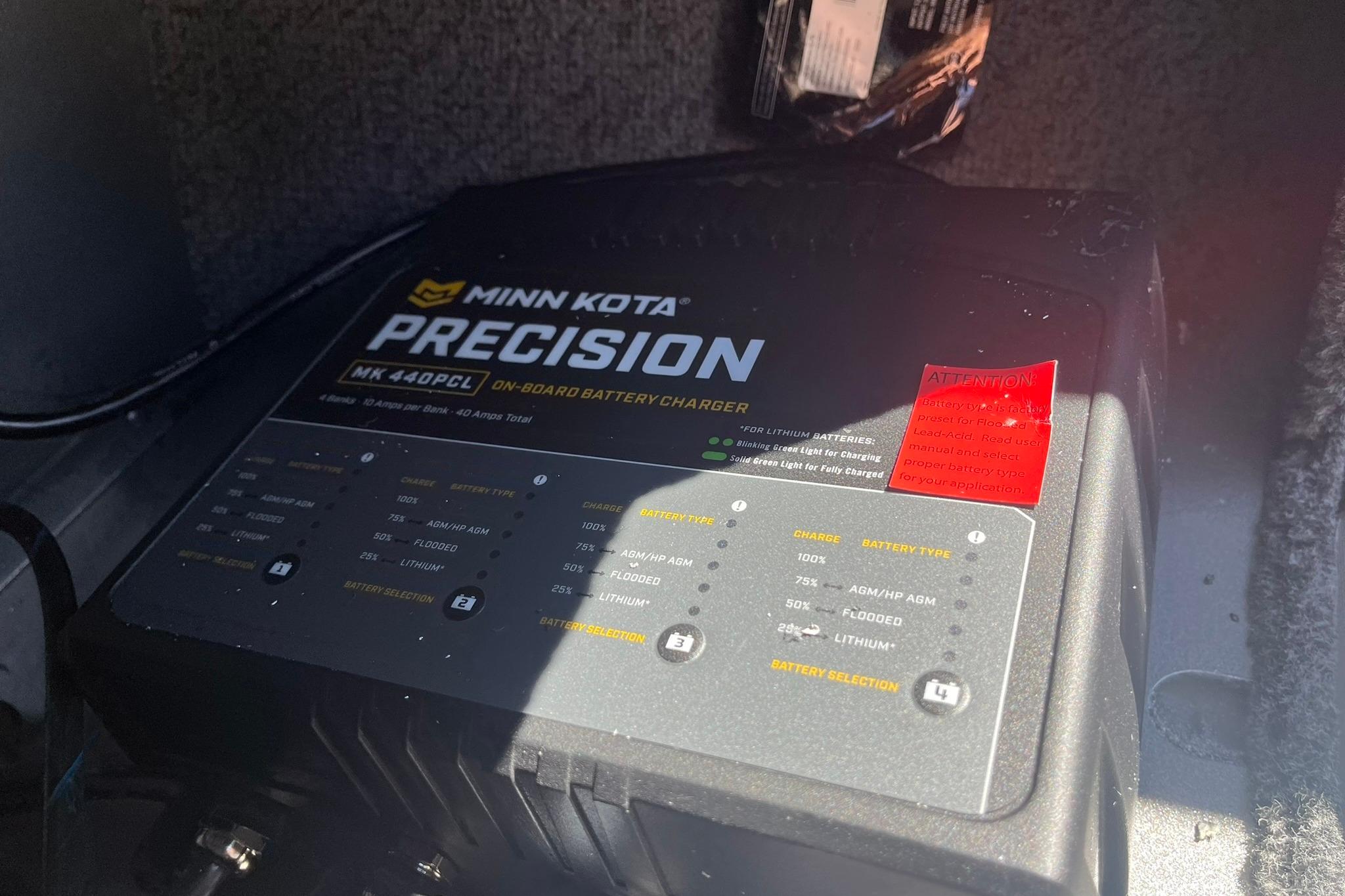 Minn Kota Precision MK 440PC onboard battery charger in 2026 Lund 1875 Fisherman boat.