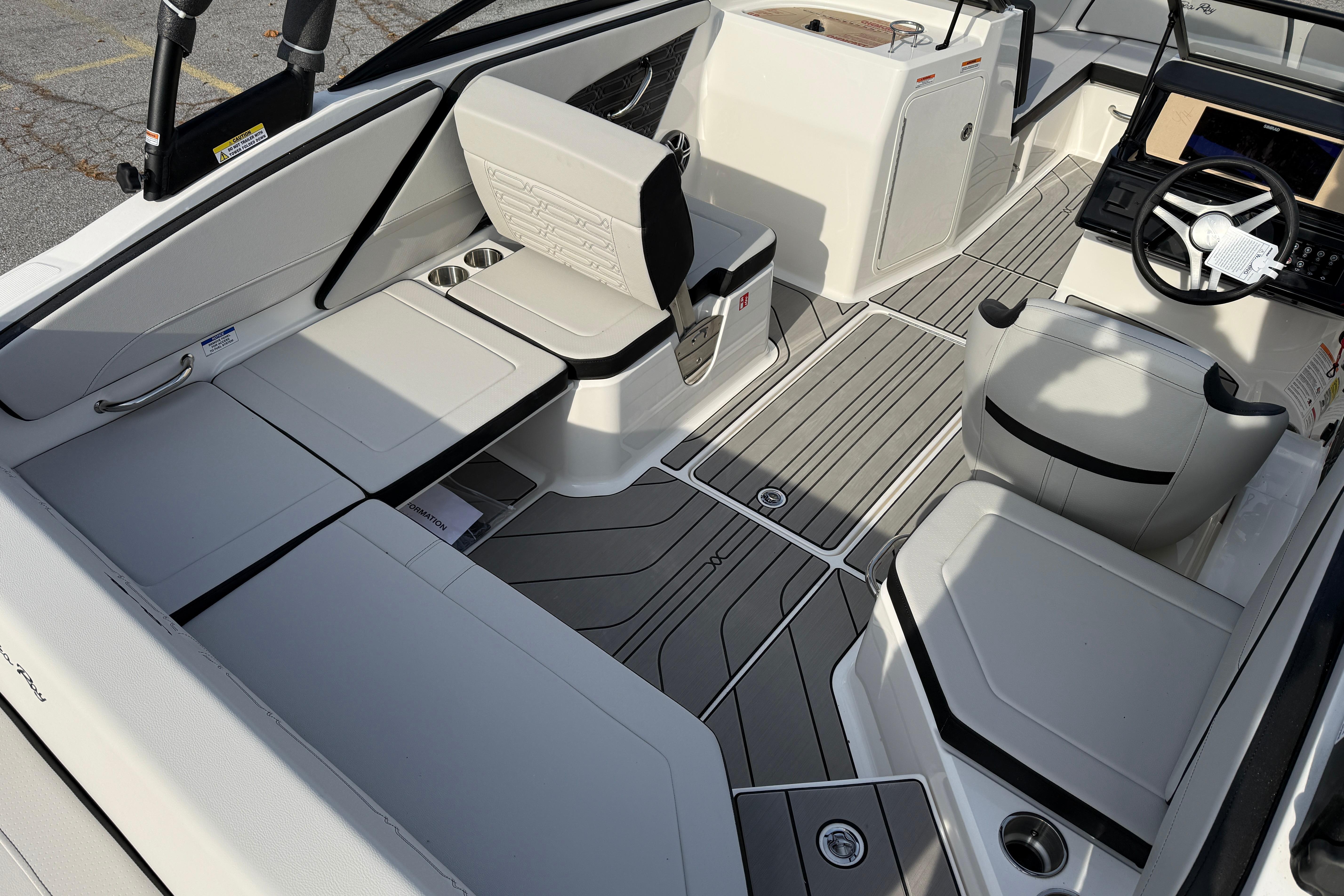 2026 Sea Ray SPX 210 Outboard interior with modern seating and sleek design.