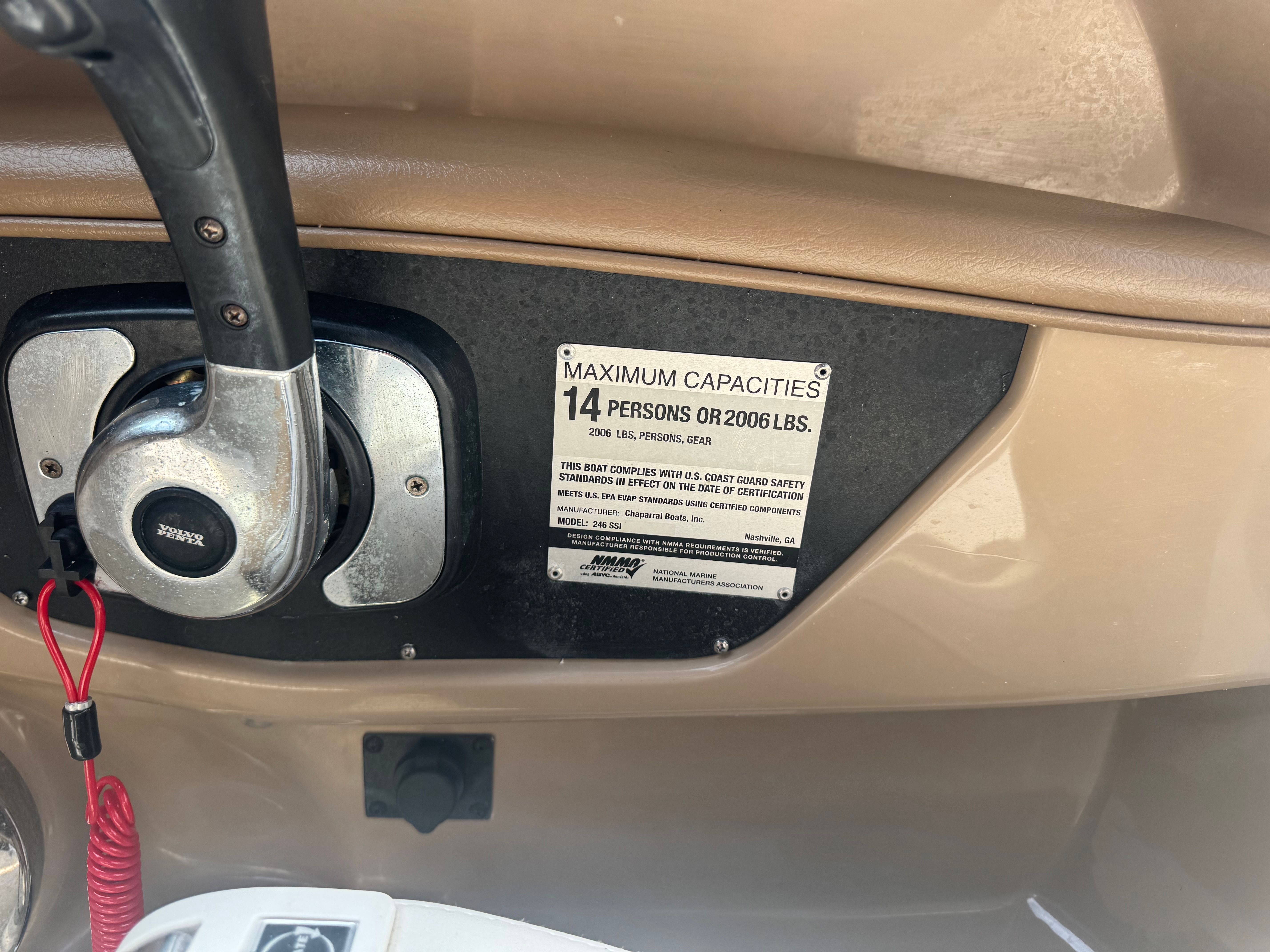 Chaparral 246 SSi 2016 control panel with capacity label.