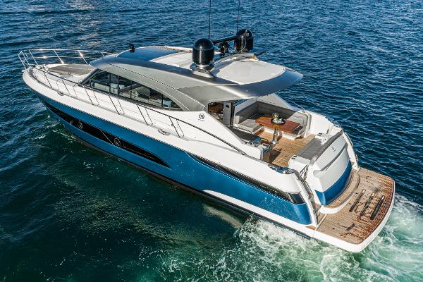 2021 Riviera 5400 Sport Yacht cruising on open water.