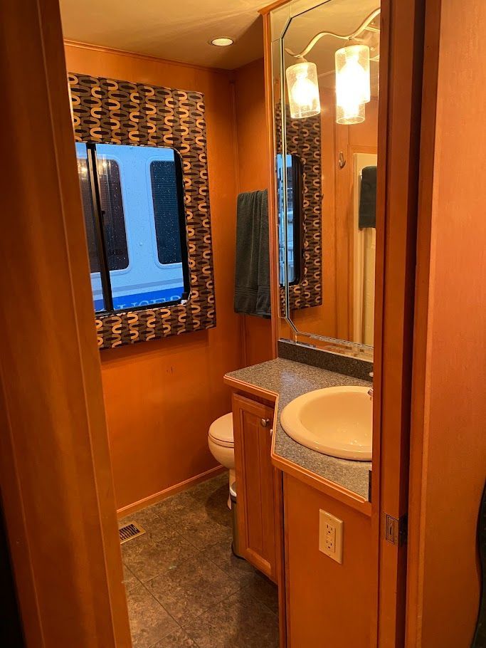Bathroom in a 2006 Summersun Houseboats 16x68 model.