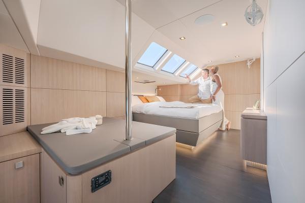Luxurious cabin interior of 2025 Privilege Signature 650 yacht with modern design.