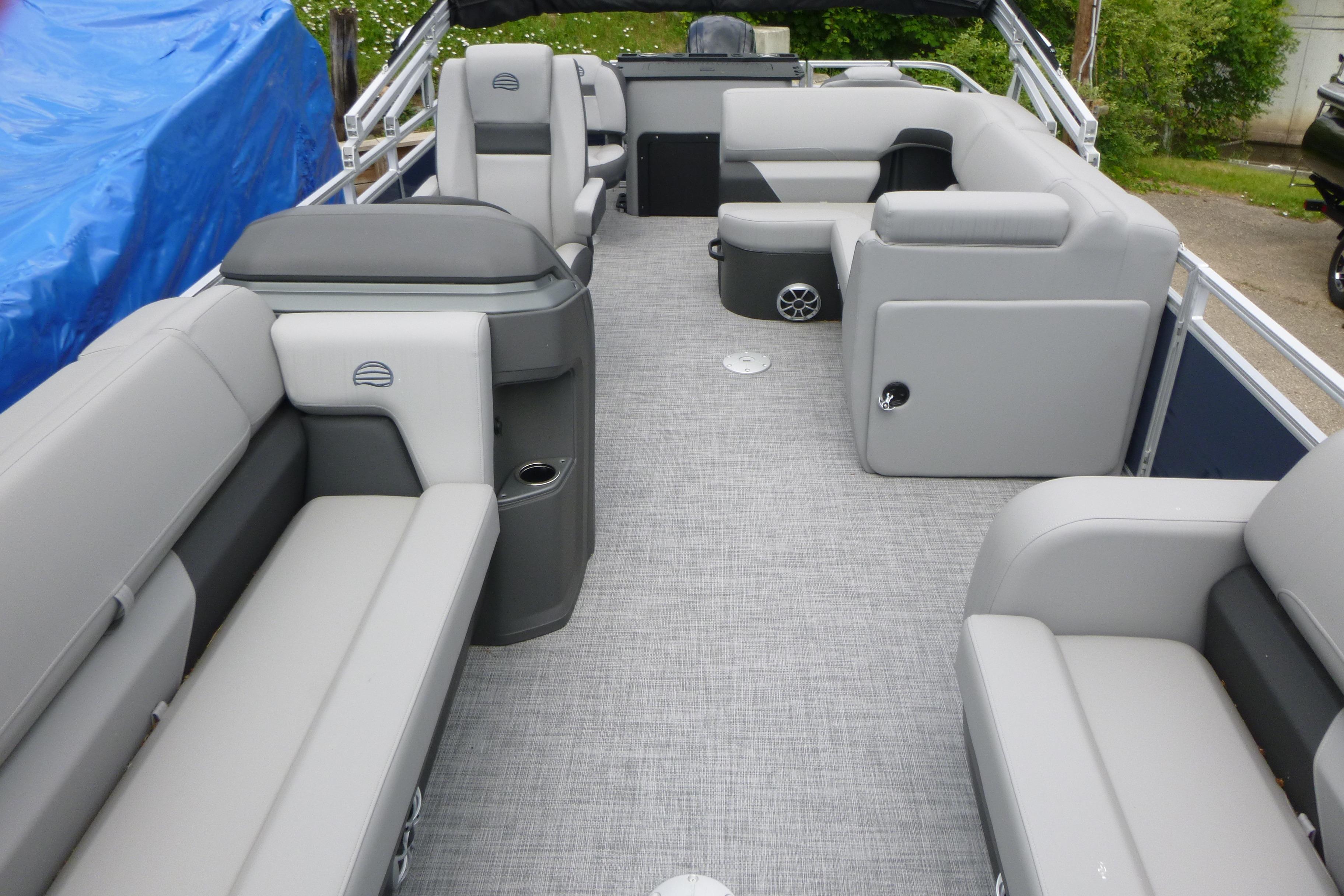 2026 Sun Tracker SportFish 22 DLX pontoon boat interior with spacious seating and modern design.