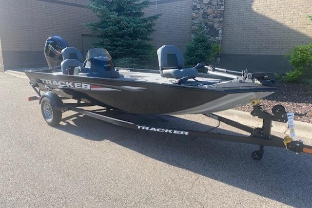 2026 Tracker Pro 170 boat on trailer, parked outdoors in sunlight.