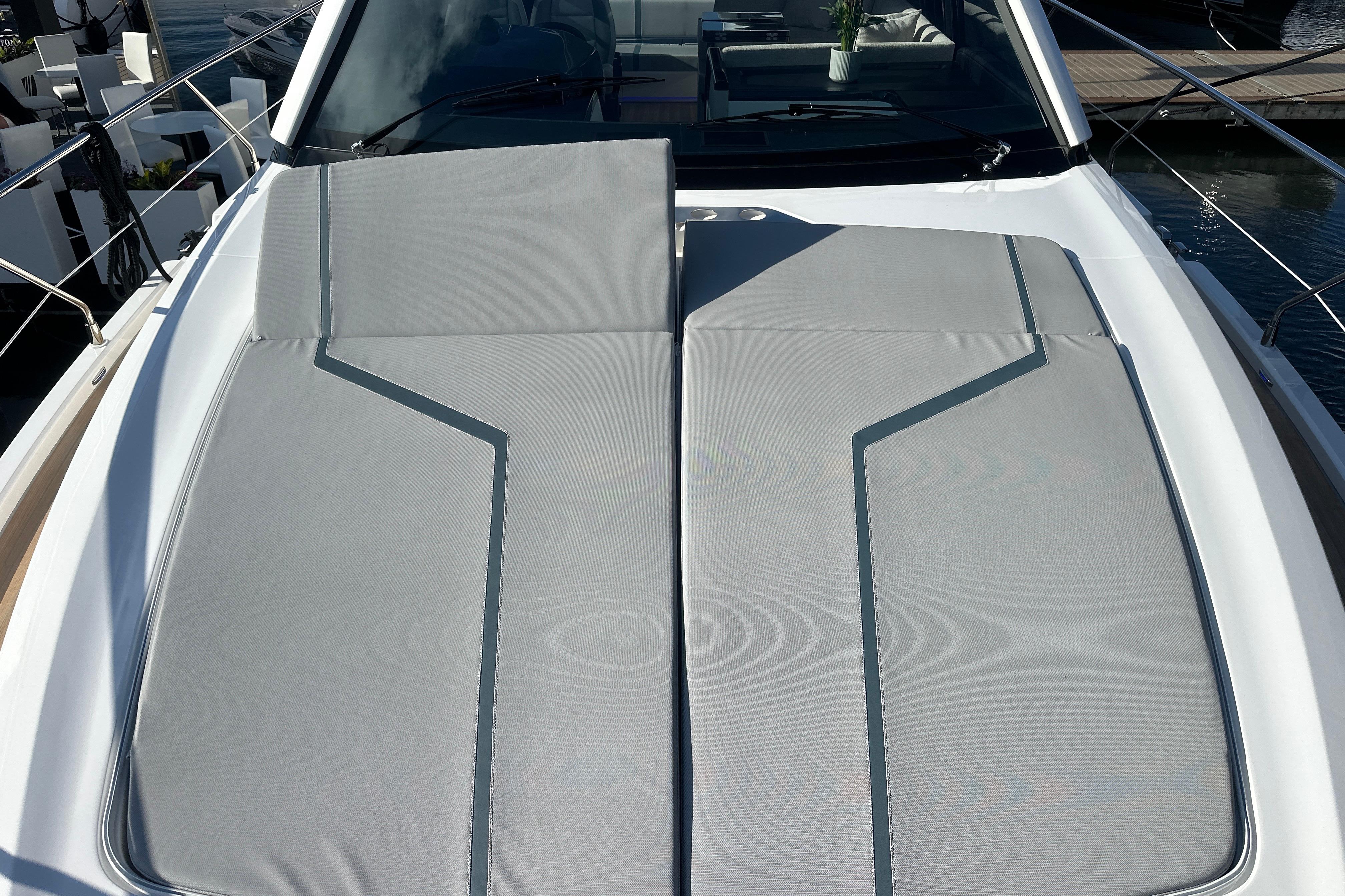 2026 Fairline Targa 47 GT yacht with sleek sunbed on deck.