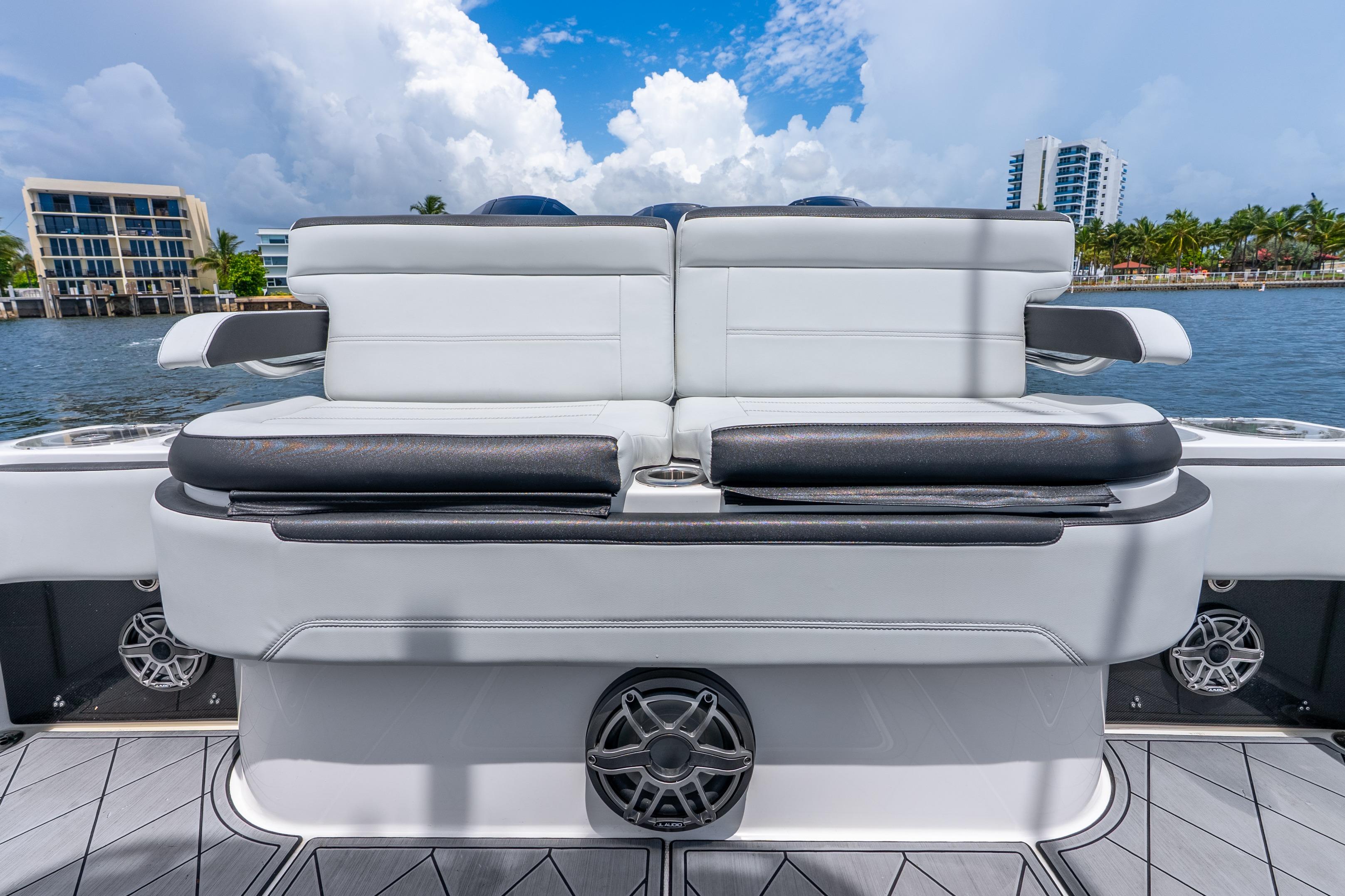 2024 Nor-Tech 452 Super Fish boat seating with modern design and waterfront view.