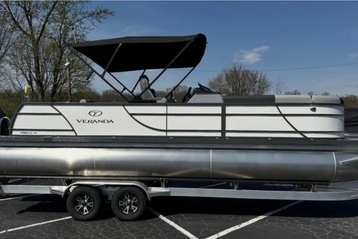 2025 Veranda Relax VR25VLC pontoon boat on trailer, featuring sleek design and canopy.