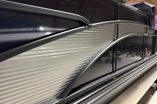 2026 Bennington 22SXSB pontoon boat with sleek, modern design and metallic accents.