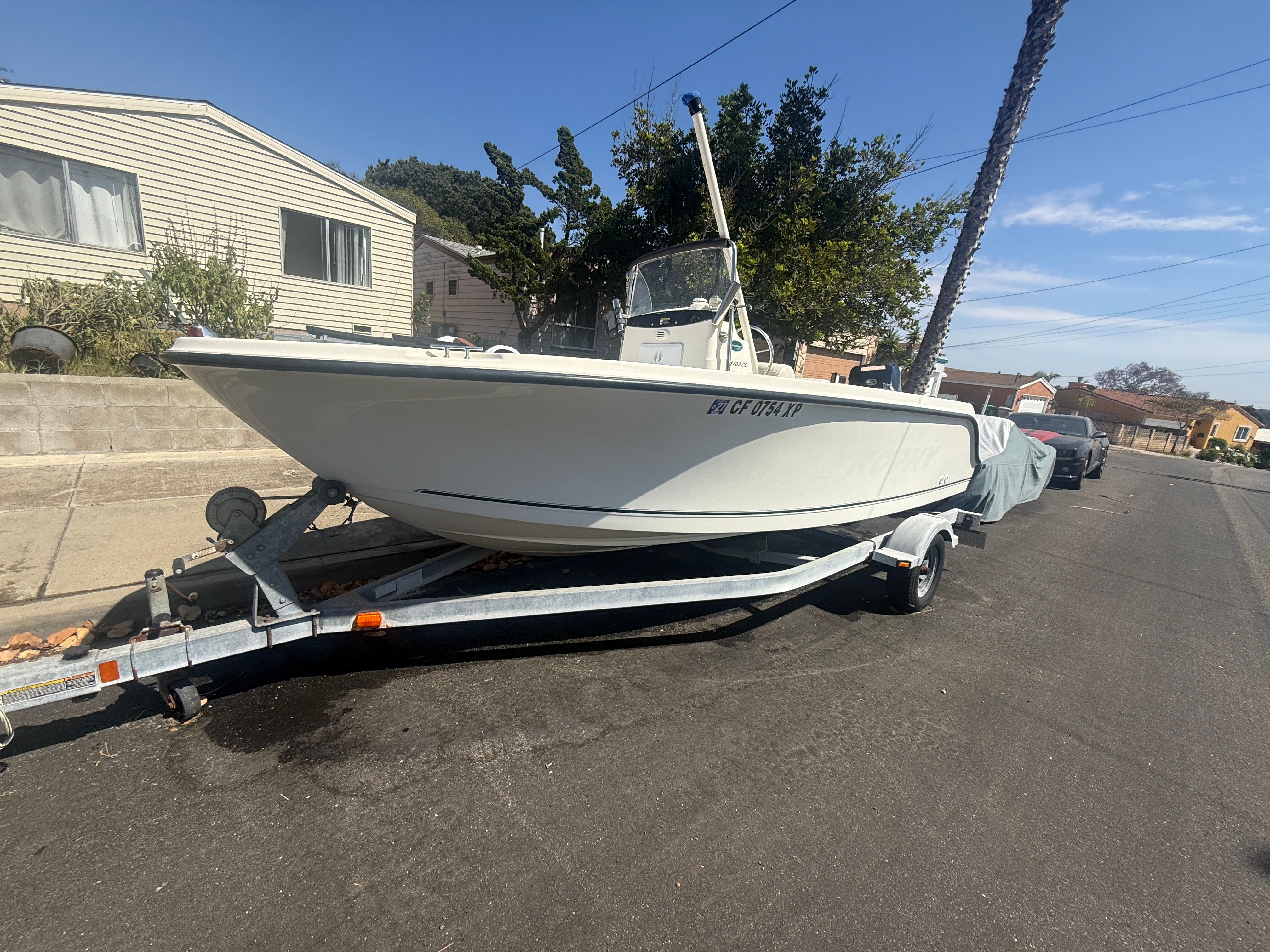 2008 Trophy 1703 Center Console boat parked on trailer.