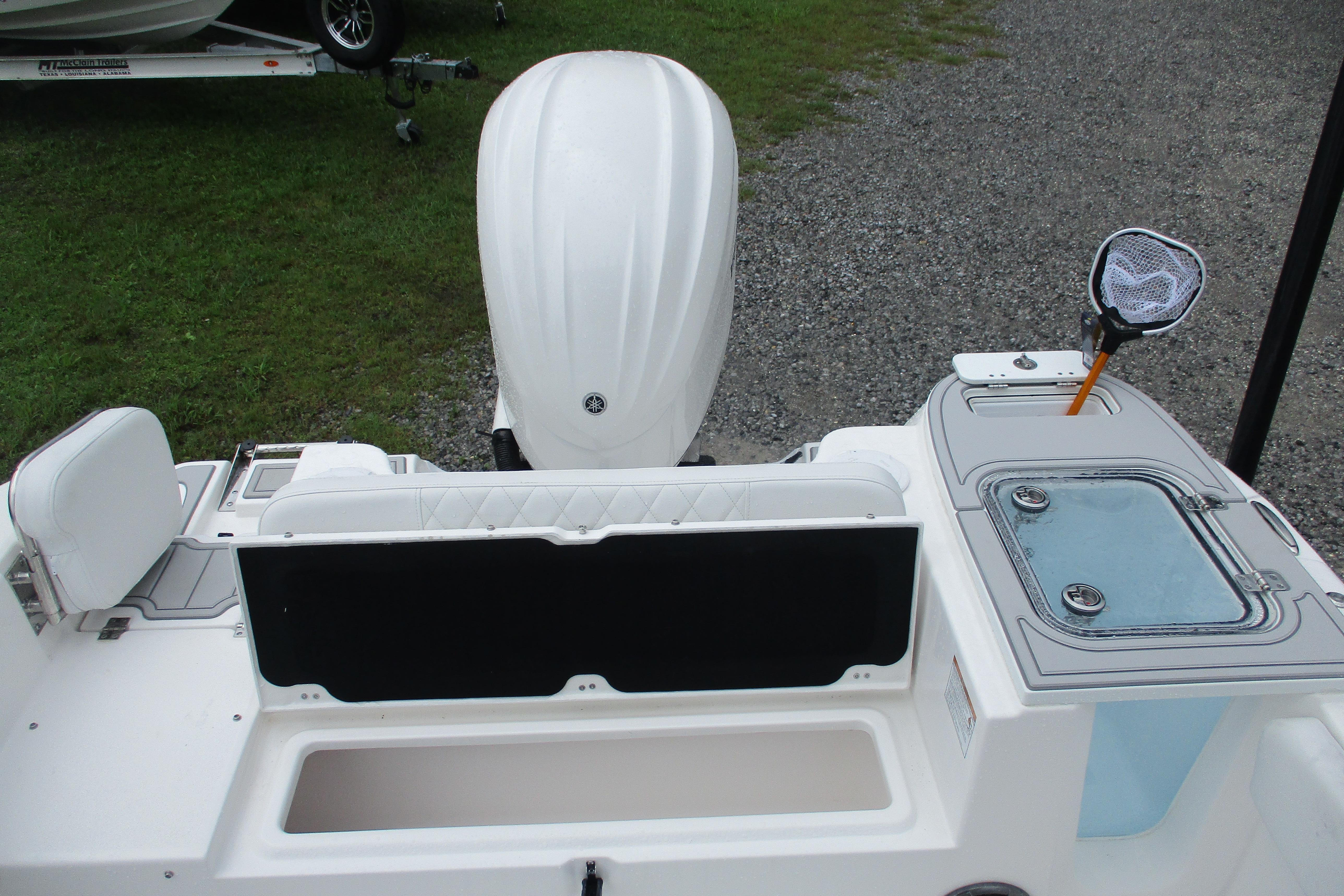 2026 Sea Fox 248 Commander boat with outboard motor and fishing equipment.