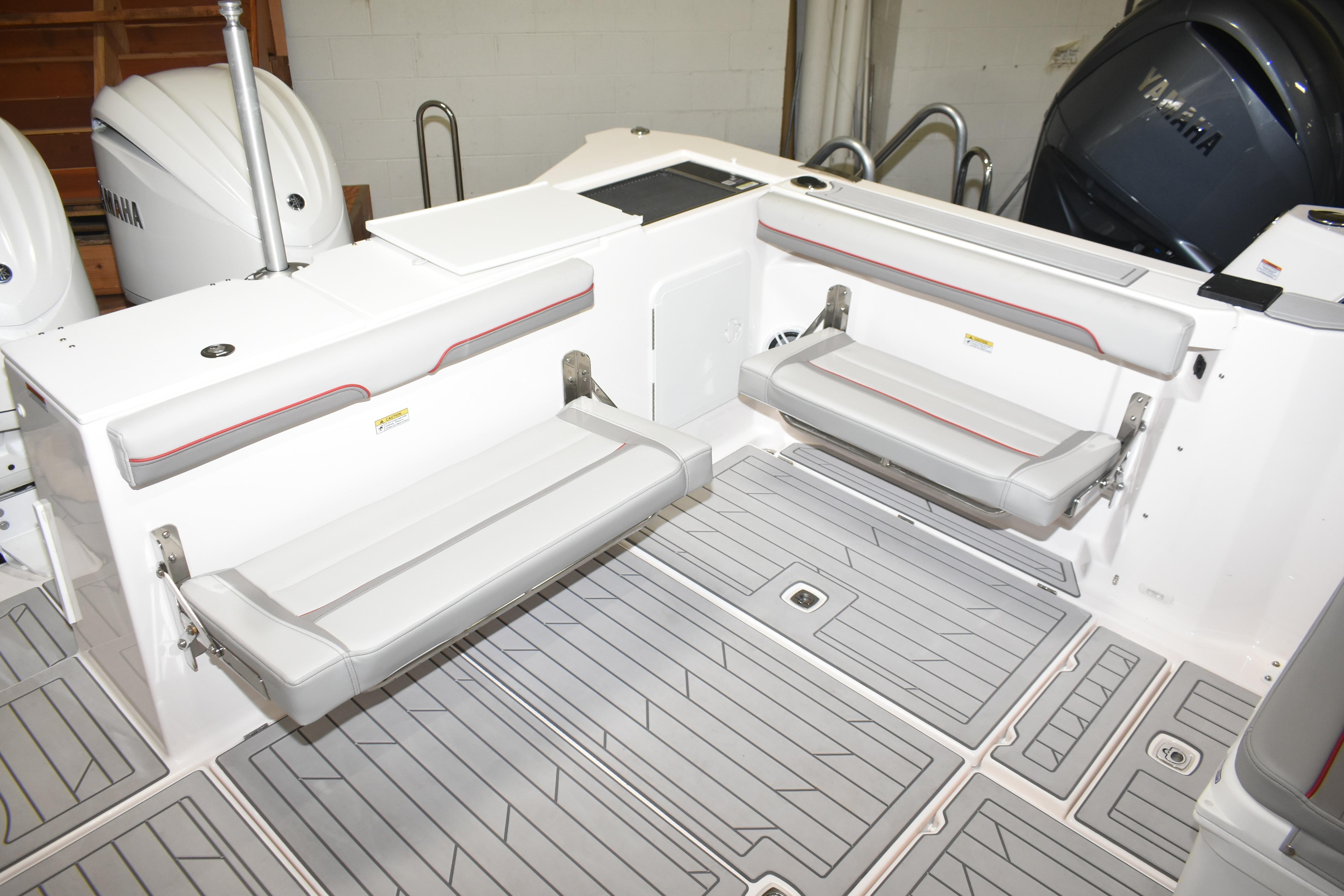2025 Solara S-310 CW boat interior with foldable seating and Yamaha engines.
