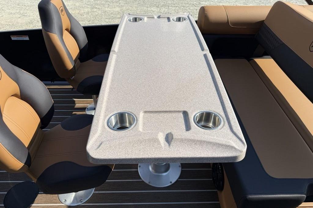 Interior of 2026 Premier 250 Solaris RS CL boat with seating and table.