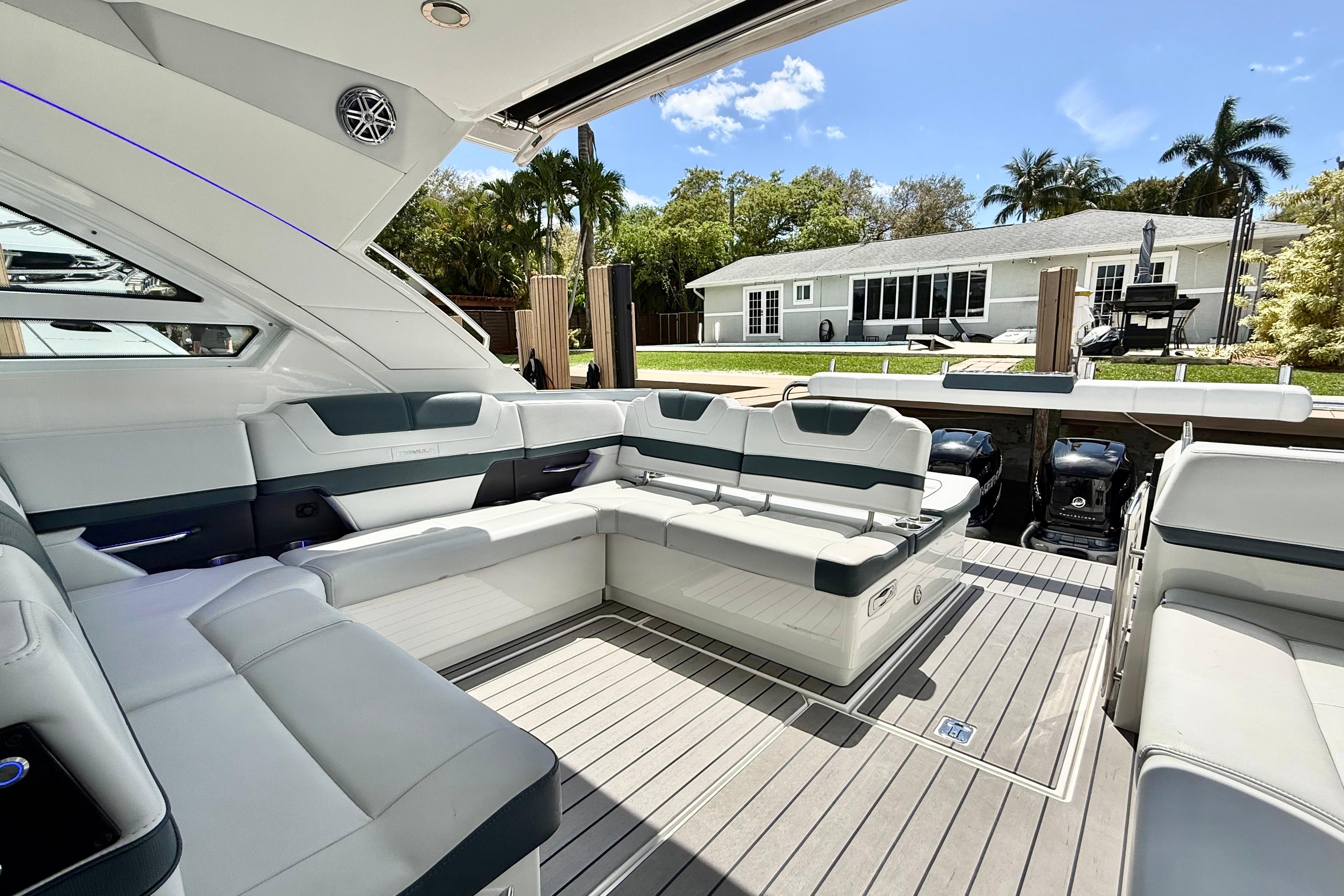 Luxurious 2020 Formula 400 Super Sport Crossover yacht interior with plush seating and modern design.