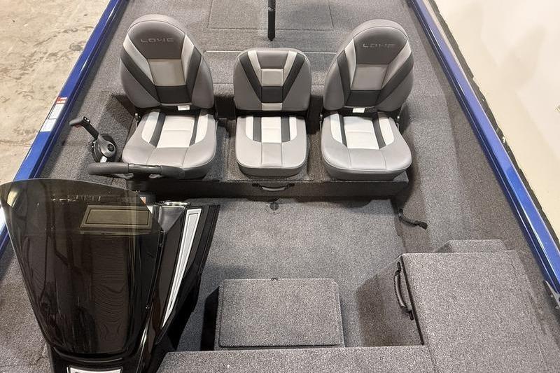 2026 Lowe Stinger 175C boat interior with three gray seats and carpeted flooring.