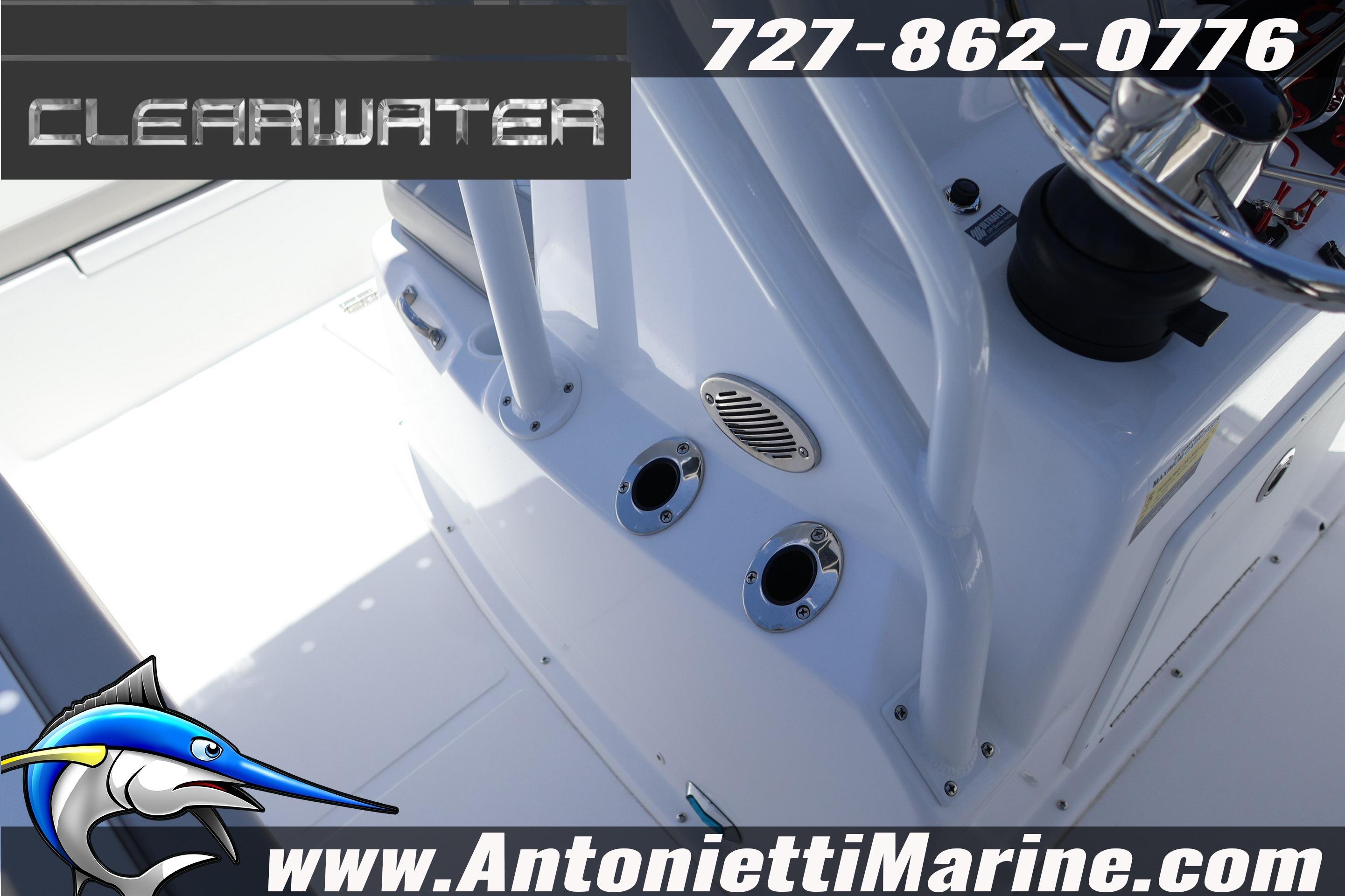 Clearwater 2000 Center Console boat interior, featuring steering wheel and console details, 2026 model.