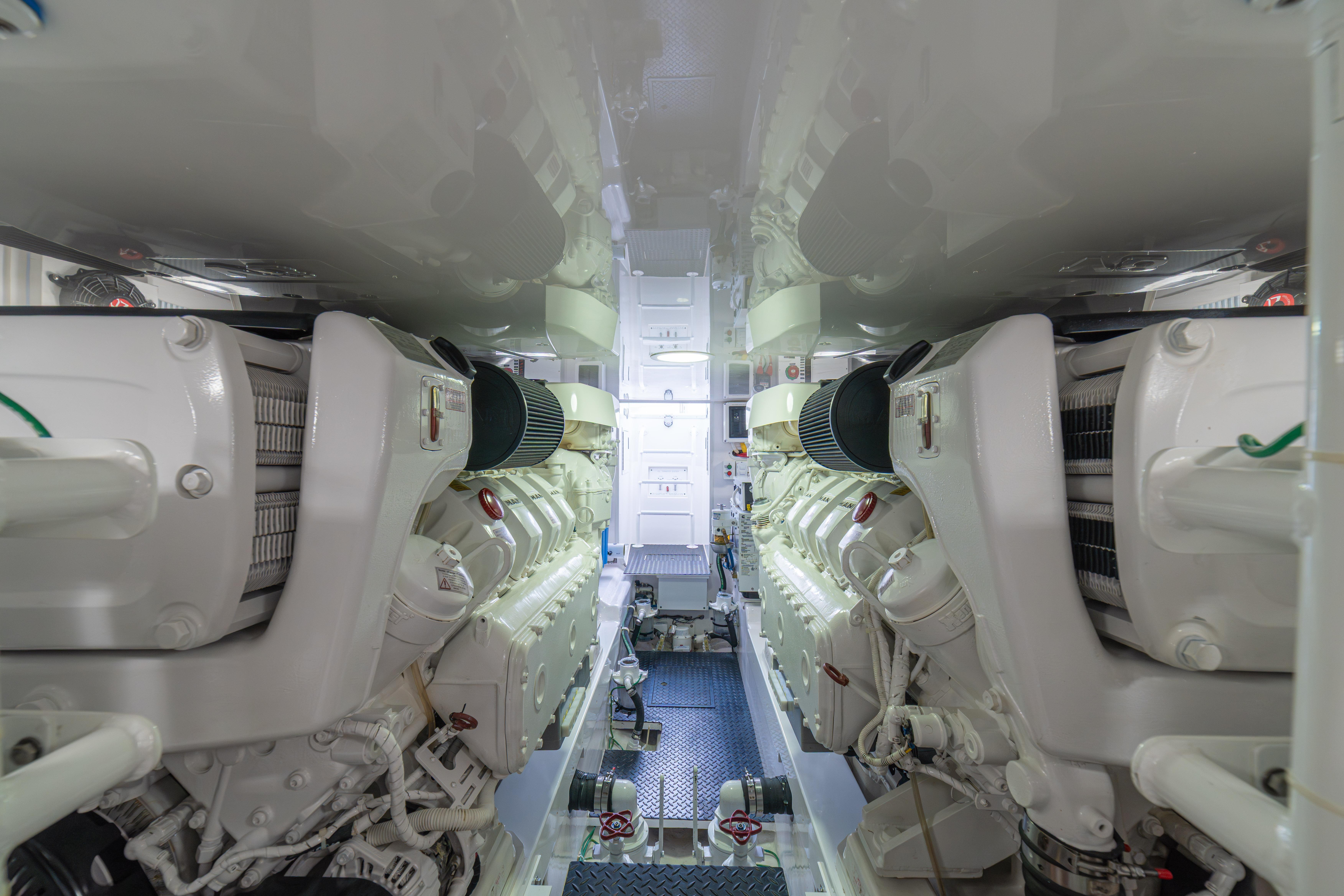 Engine room of 2024 Viking 48 Convertible yacht, showcasing powerful dual engines.
