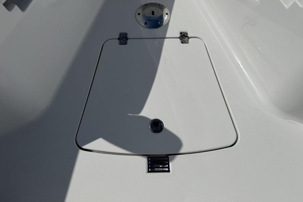 2026 Sportsman Open 252 Center Console deck hatch, featuring sleek design and durable hinges.