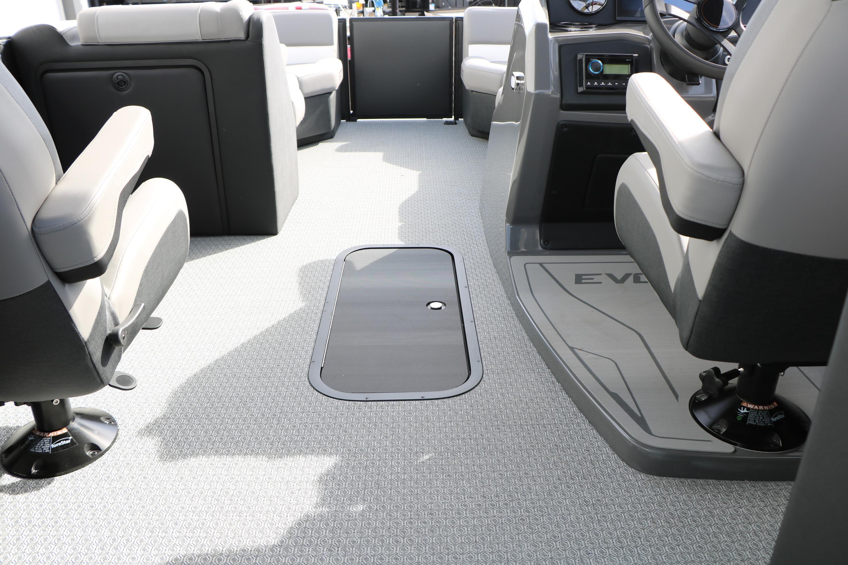 Interior of 2026 Evotti 521QL boat with modern seating and control panel.