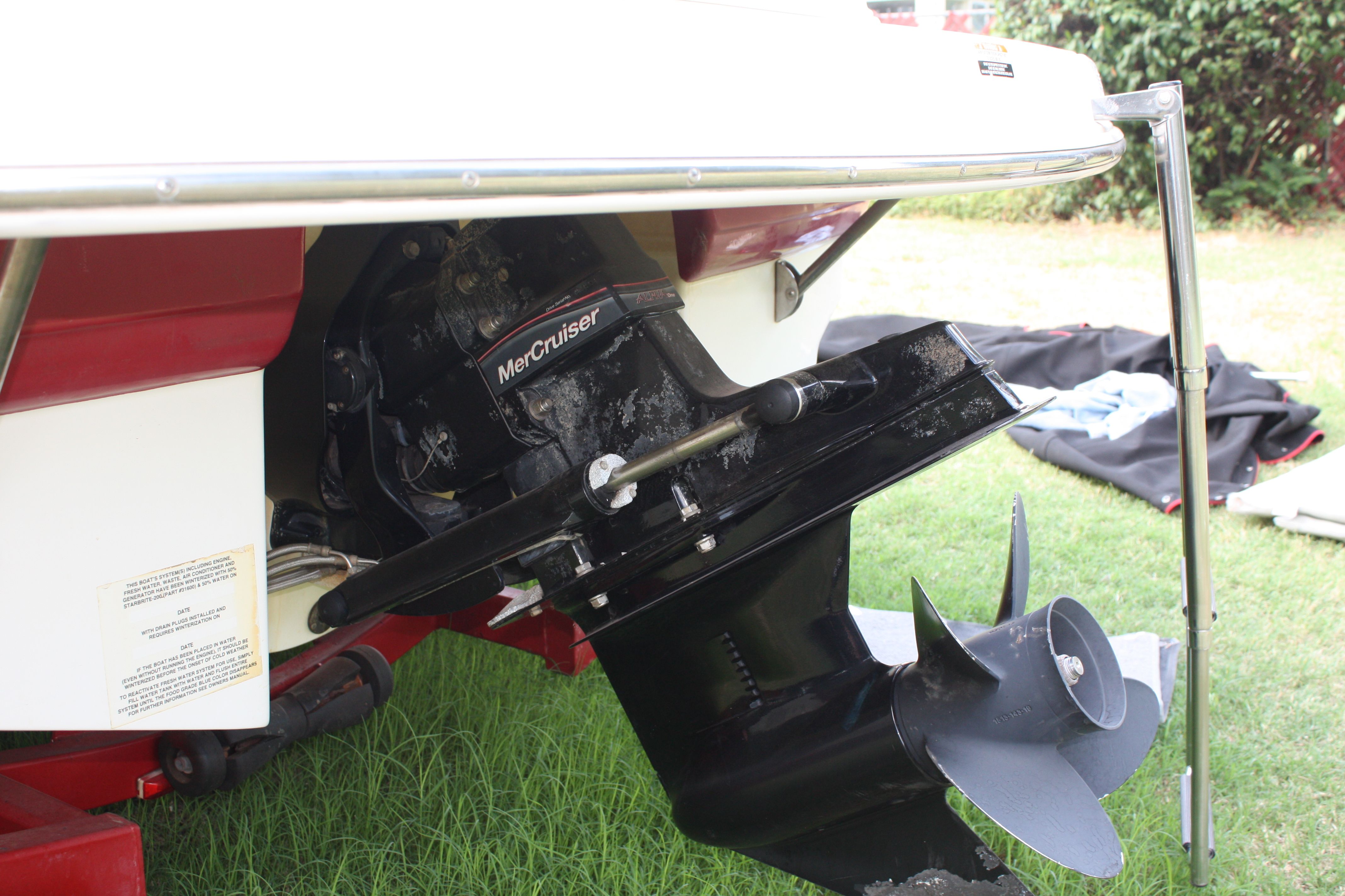 Close-up of a 2007 Chaparral 210 SSi boat's drive on grass.