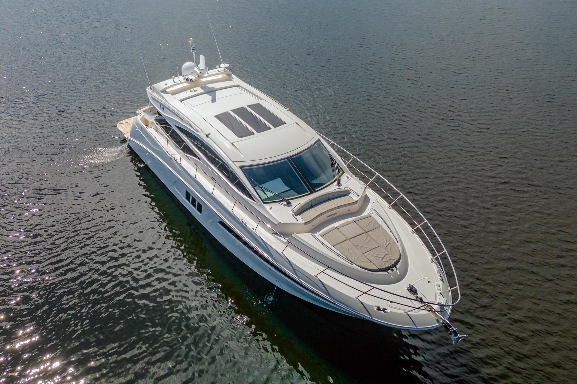 2018 Sea Ray L590 luxury yacht cruising on calm waters.