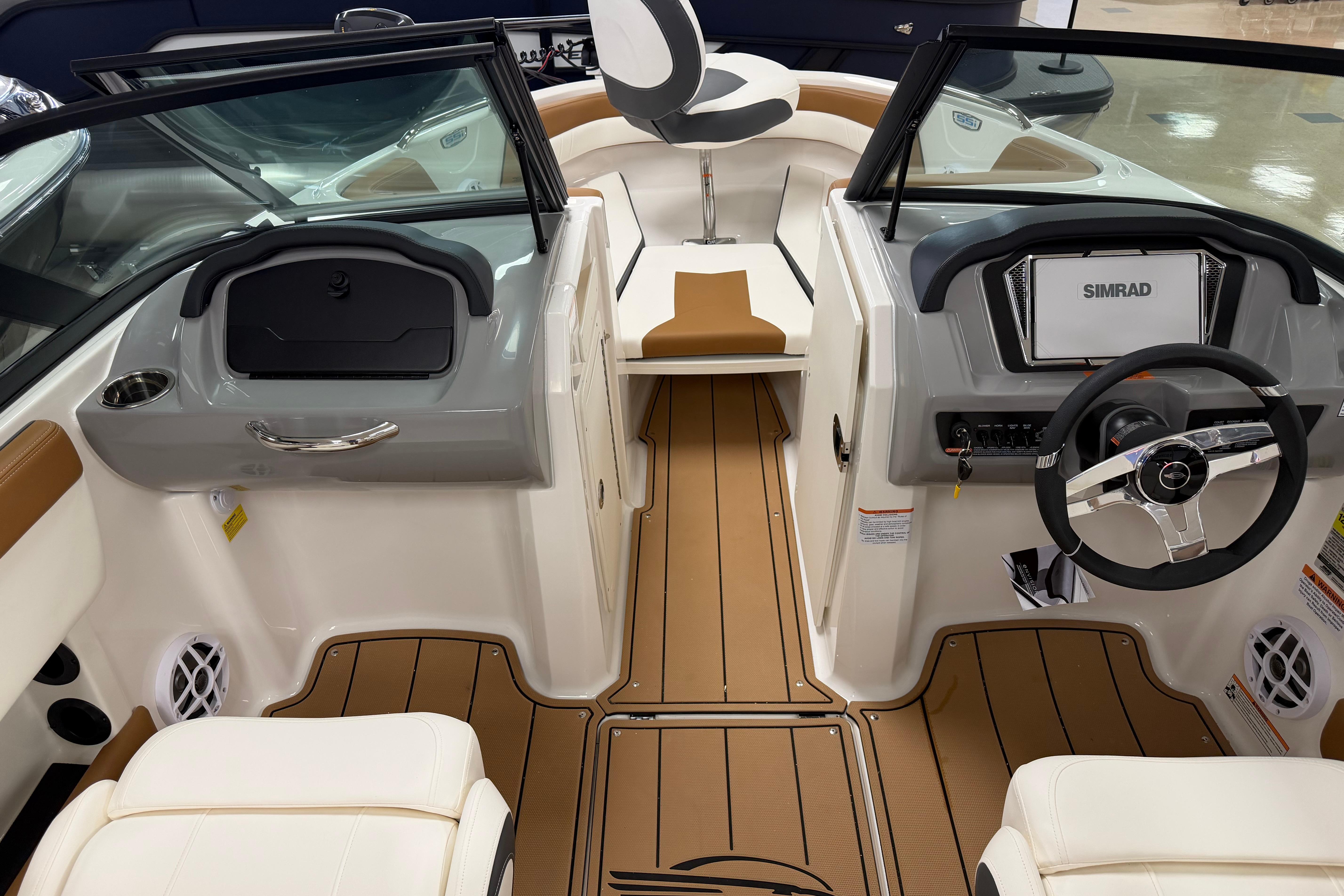 2026 Chaparral 21 SSi Ski & Fish boat interior with modern dashboard and seating.