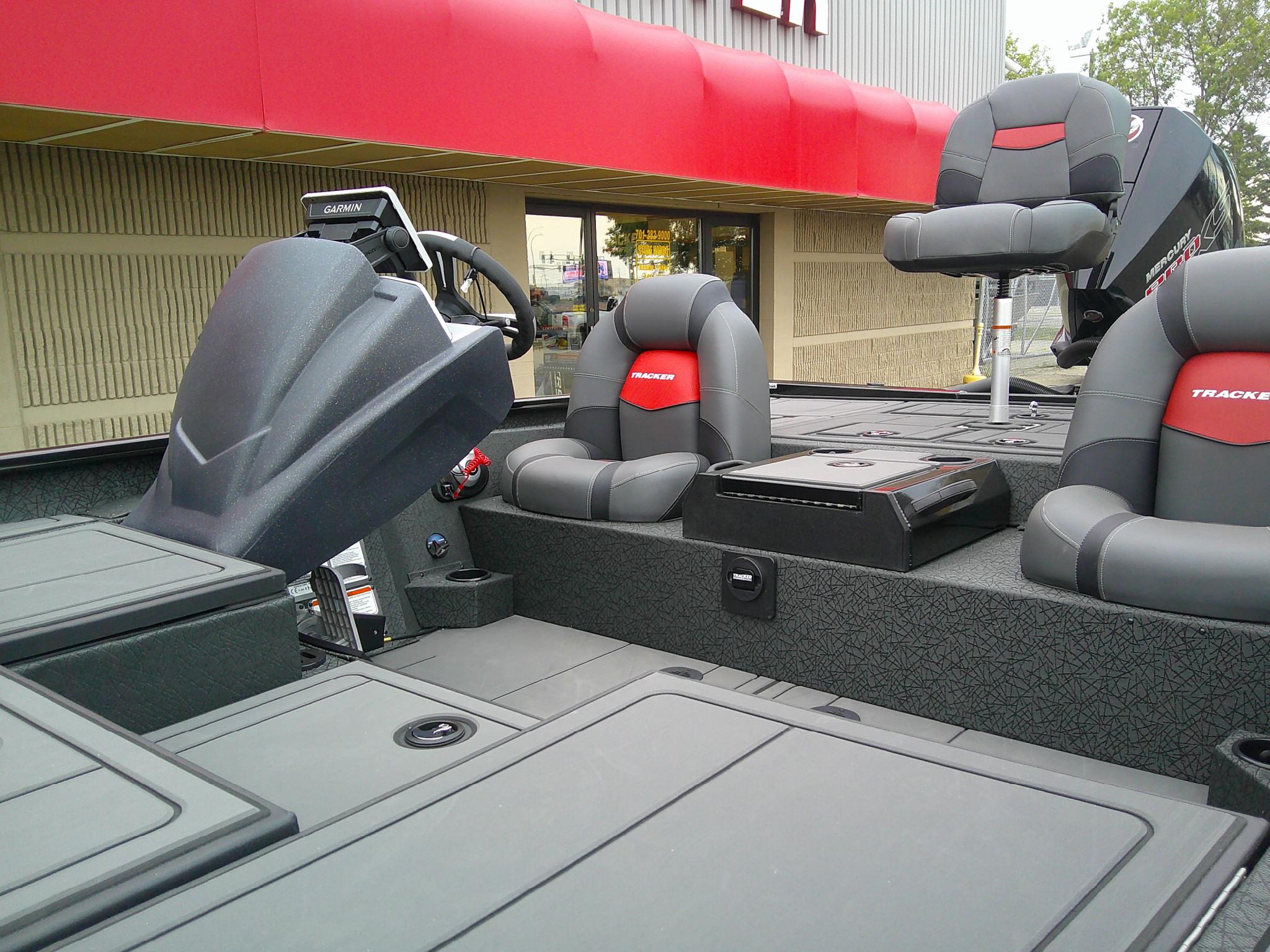 2025 Tracker Savage 215 boat interior with modern seating and steering console.