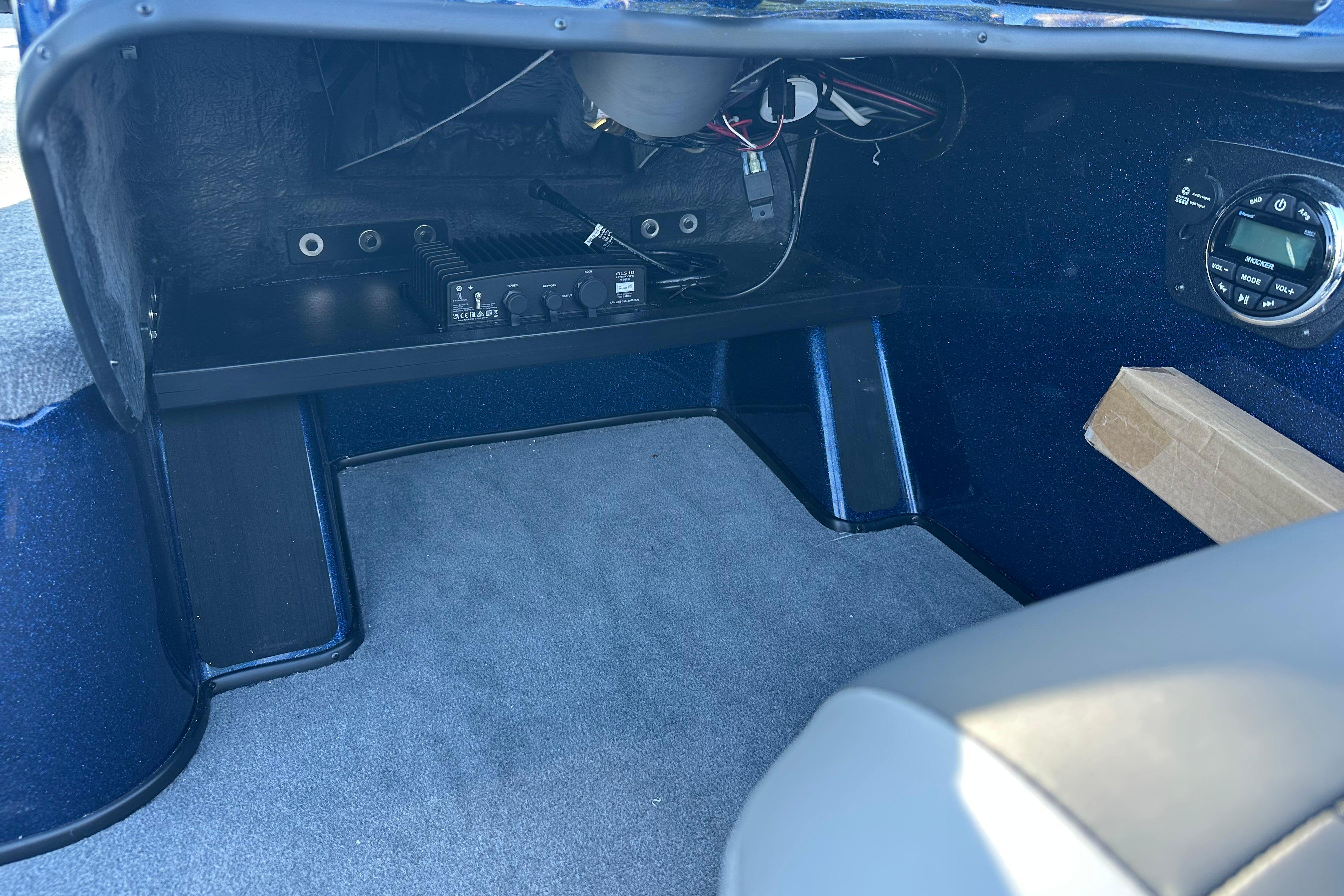 Interior of 2026 Nitro ZV19 Sport Pro boat showing dashboard and audio system.